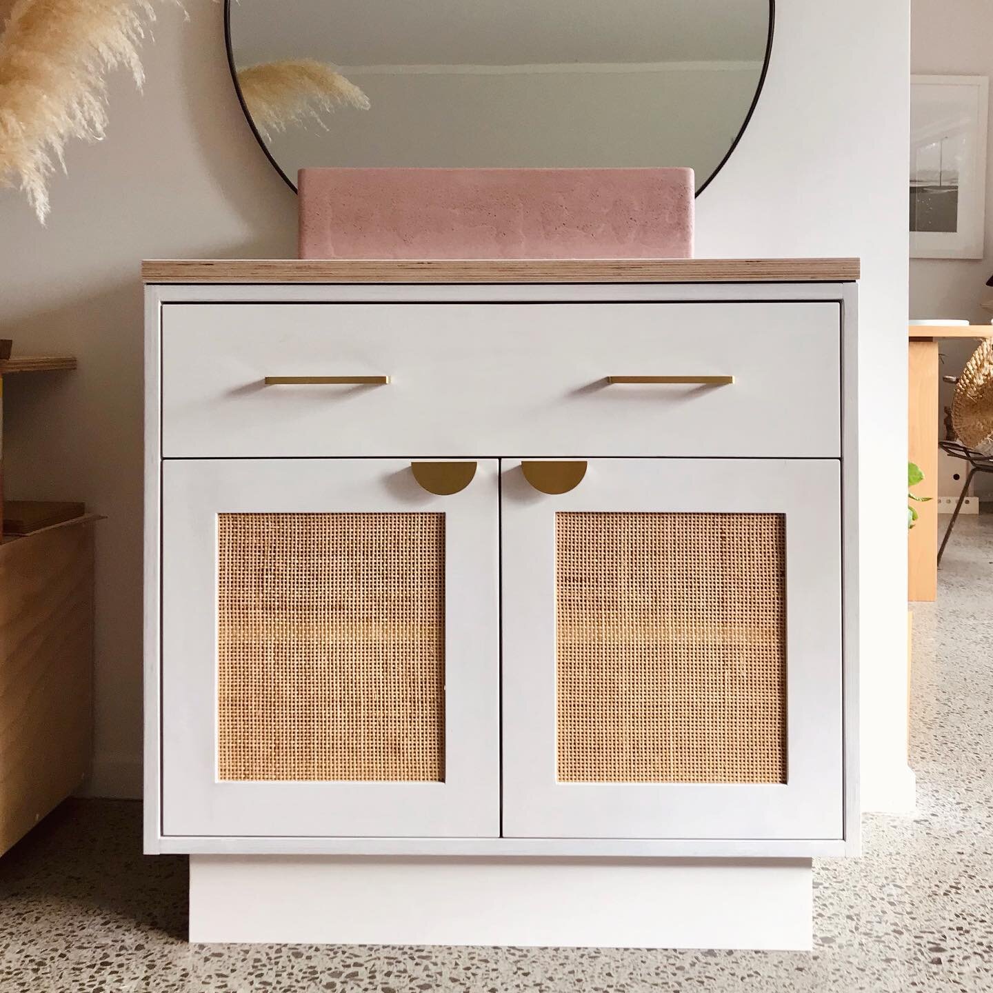 Another one of these has just left our workshop and is off to a new home 💗👋

The combination of white oiled plywood, brass handles and rattan 🫶🫶🫶

The beautiful earthy pink basin is made by Andrew from @craftedconcrete.raglan 

#motidedesign #ii