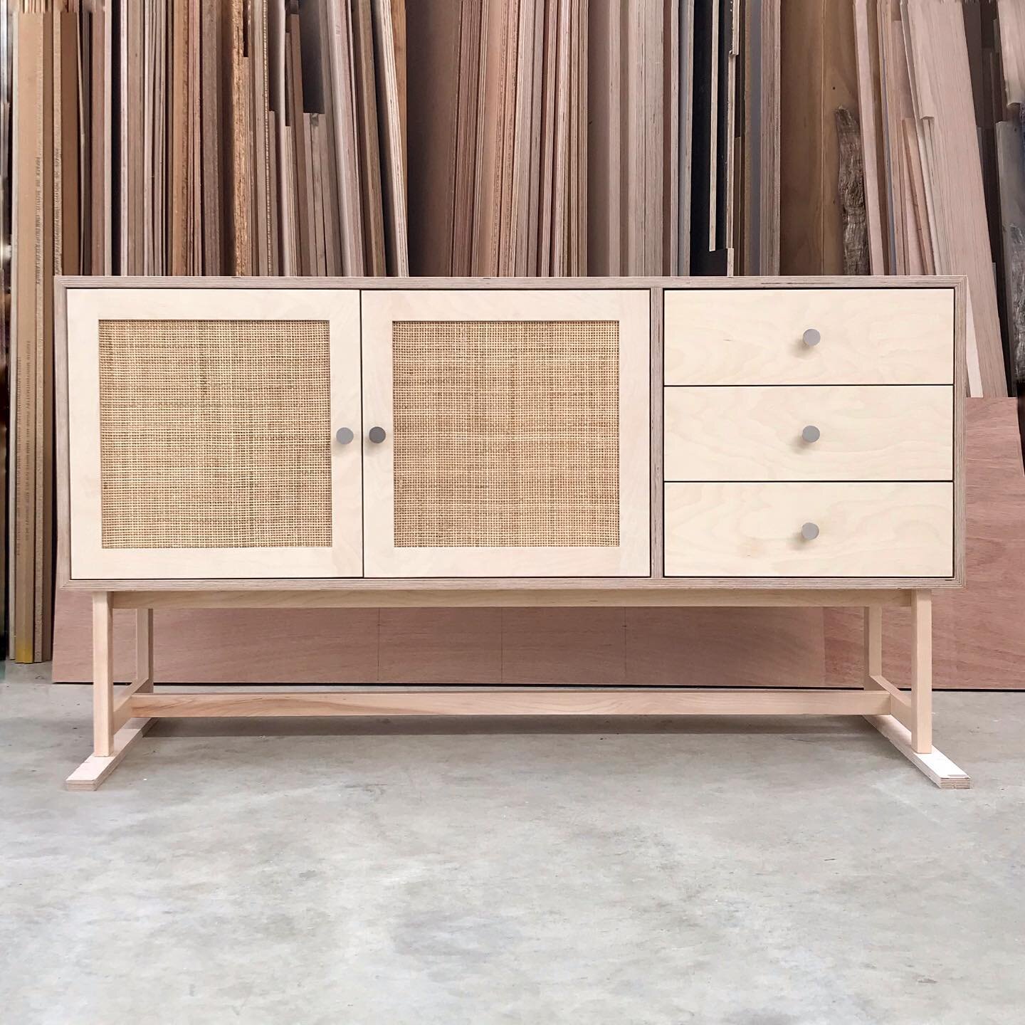 We call her 
.
❅︎ ❅︎ ❅︎ &lsquo;Miss Smilla&rsquo; ❅︎ ❅︎ ❅︎ 
.
A beautiful minimalistic sideboard in Birch and Rattan.
Paired with brushed nickel knobs, this colour variation has a fresh, nordic aesthetic. 

👉 Slide over to see Miss Smilla in a diffe