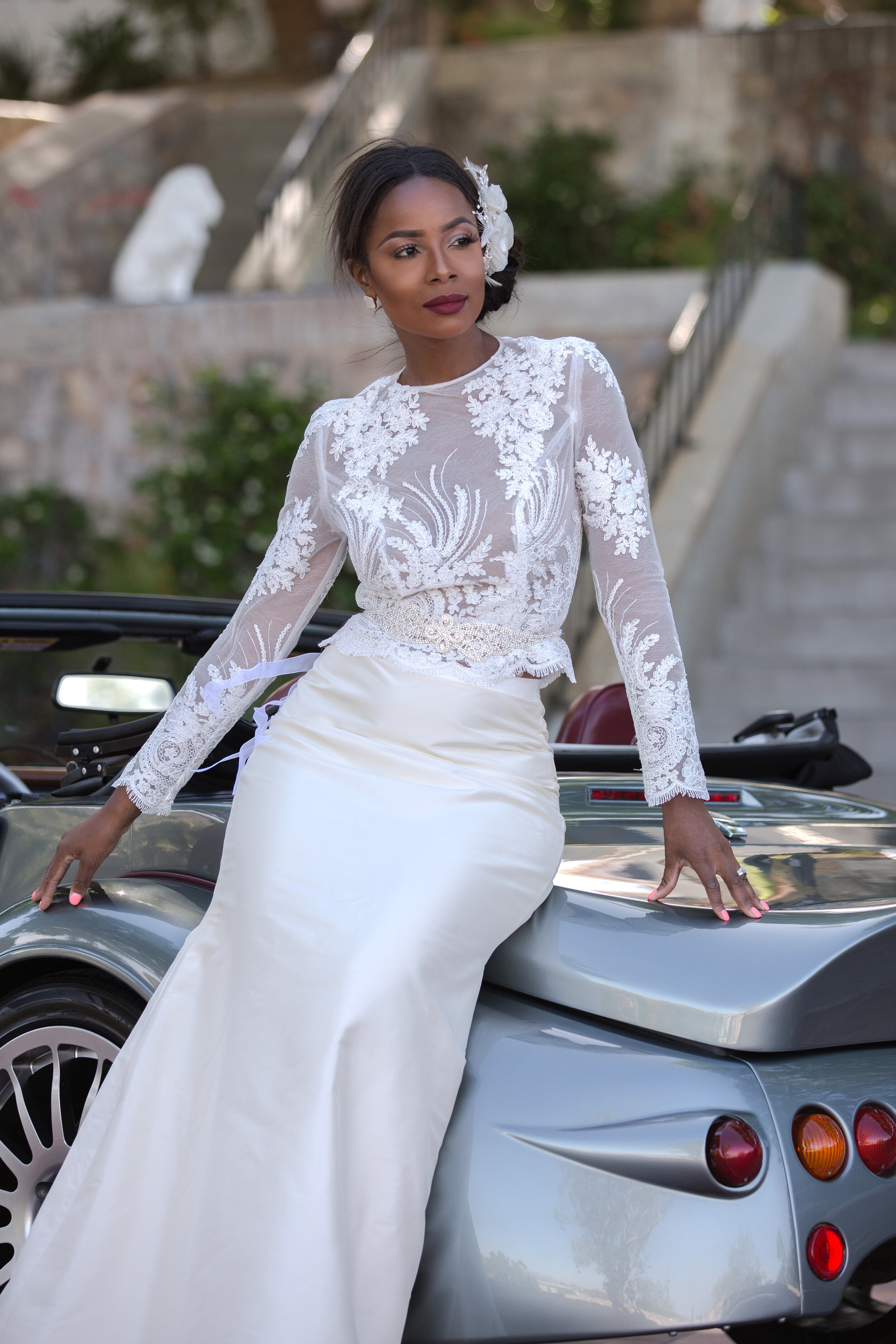 Luxury bespoke separate wedding dress silk crepe skirt and lace top leaning on Moran Aero 8.jpg