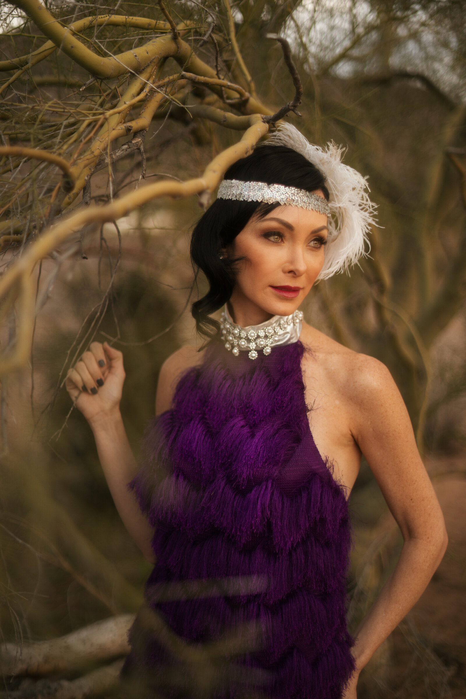 Bespoke purple fringe high collar dress accented with  silver jewelly.jpg