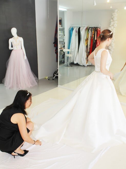 Lana Gerimovich and bride at fitting of bespoke couture wedding dress at Alis Fashion Design Scottsdale boutique.jpg