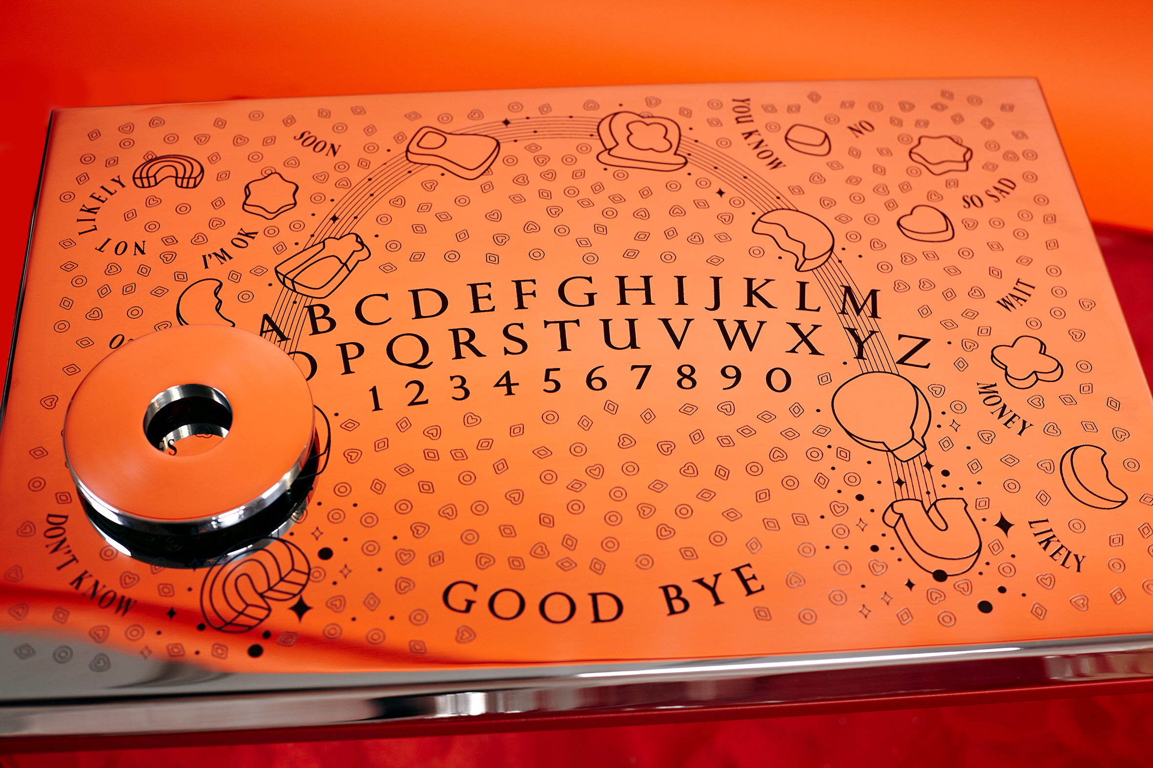  Lucky Charms Ouija   2018, 60 x 40 x 6cm, acid etched polished steel, paint 