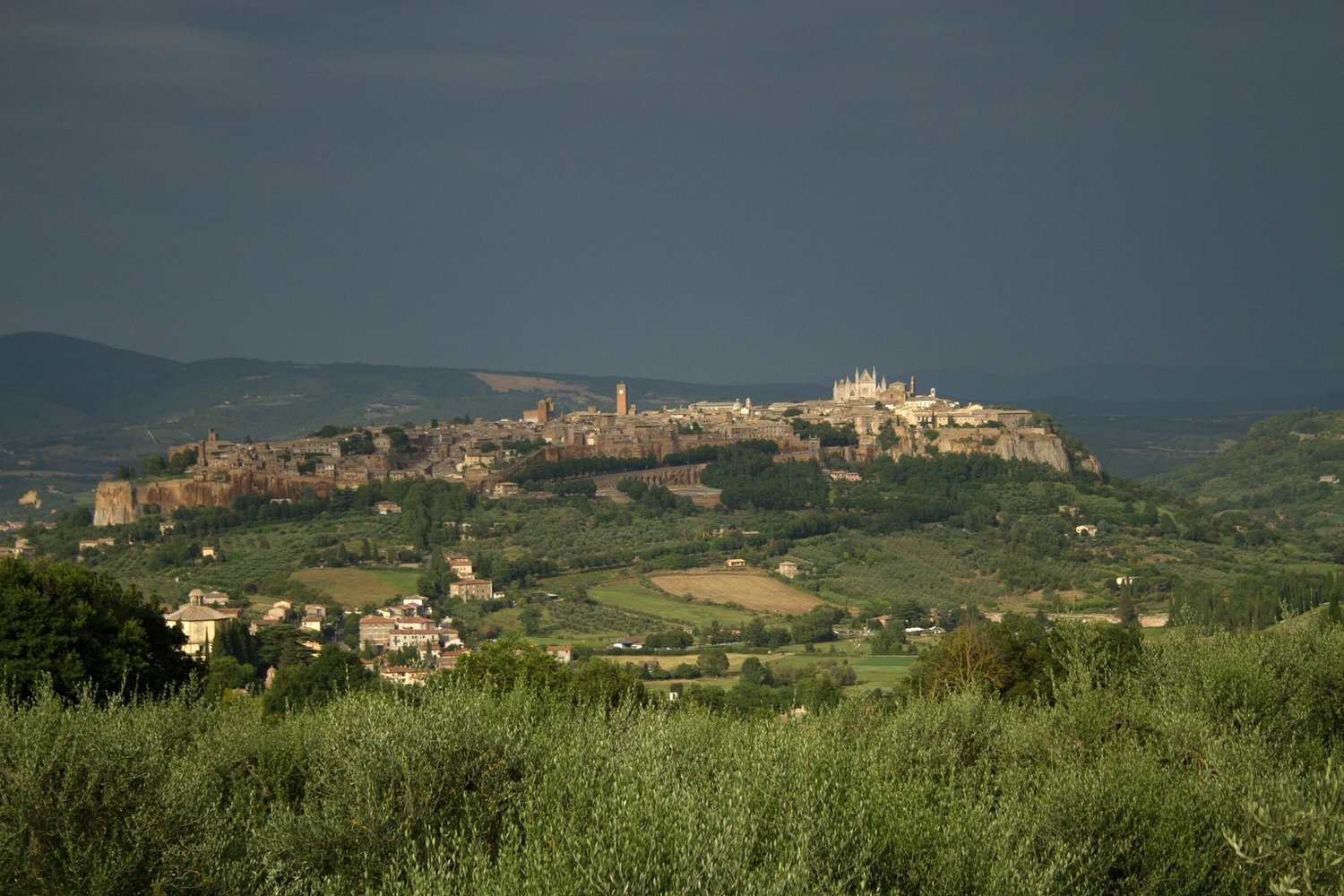  Photographer Emily Burlew caught this dramatic view as the dark clouds gathered over the still sunny Orvieto. 