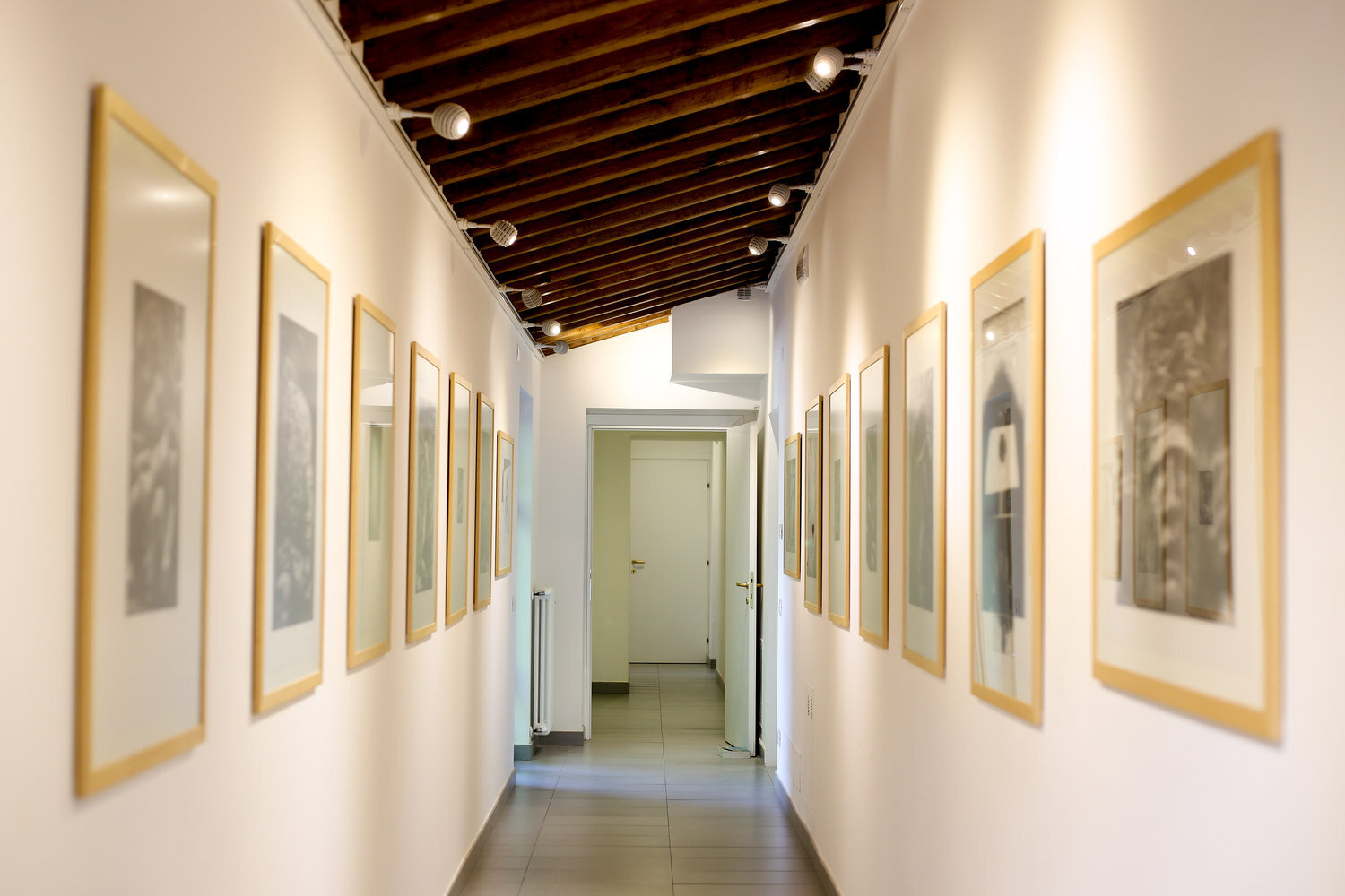  The hallway to the dining room is lined by prints from the 1993 Florence Portfolio of prints — the occasion of Bruce Herman and John Skillen’s first visit to Orvieto … the rest is history. 