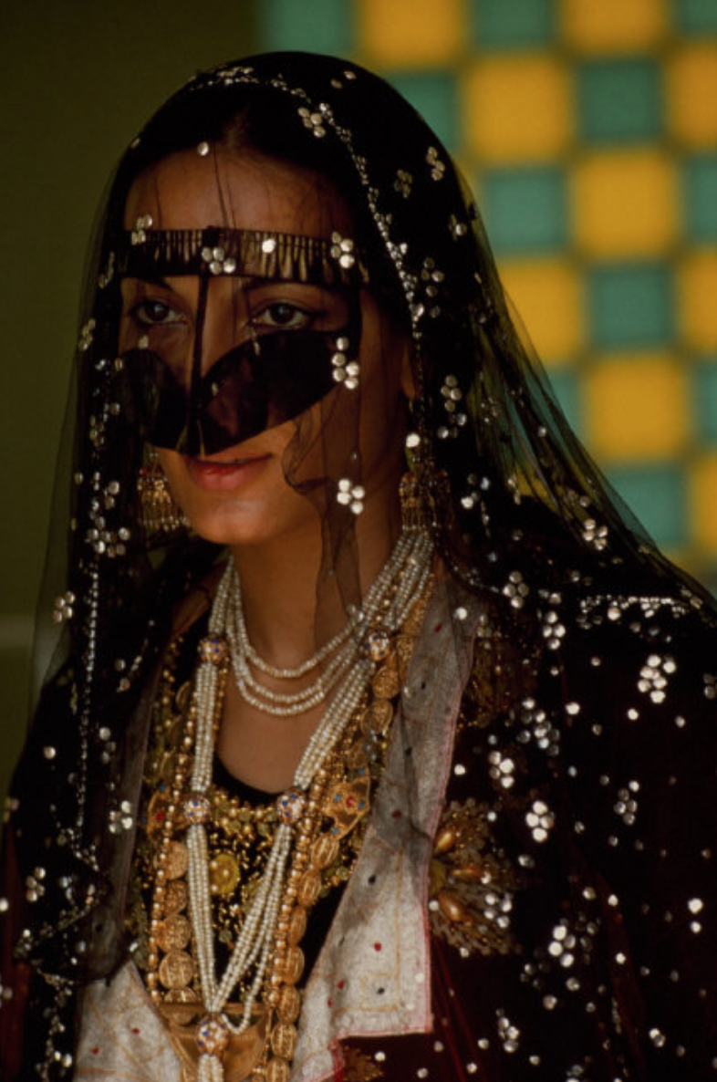 Veiled woman in a harem. United Arab Emirates. Abu Dhabi. 1970. 