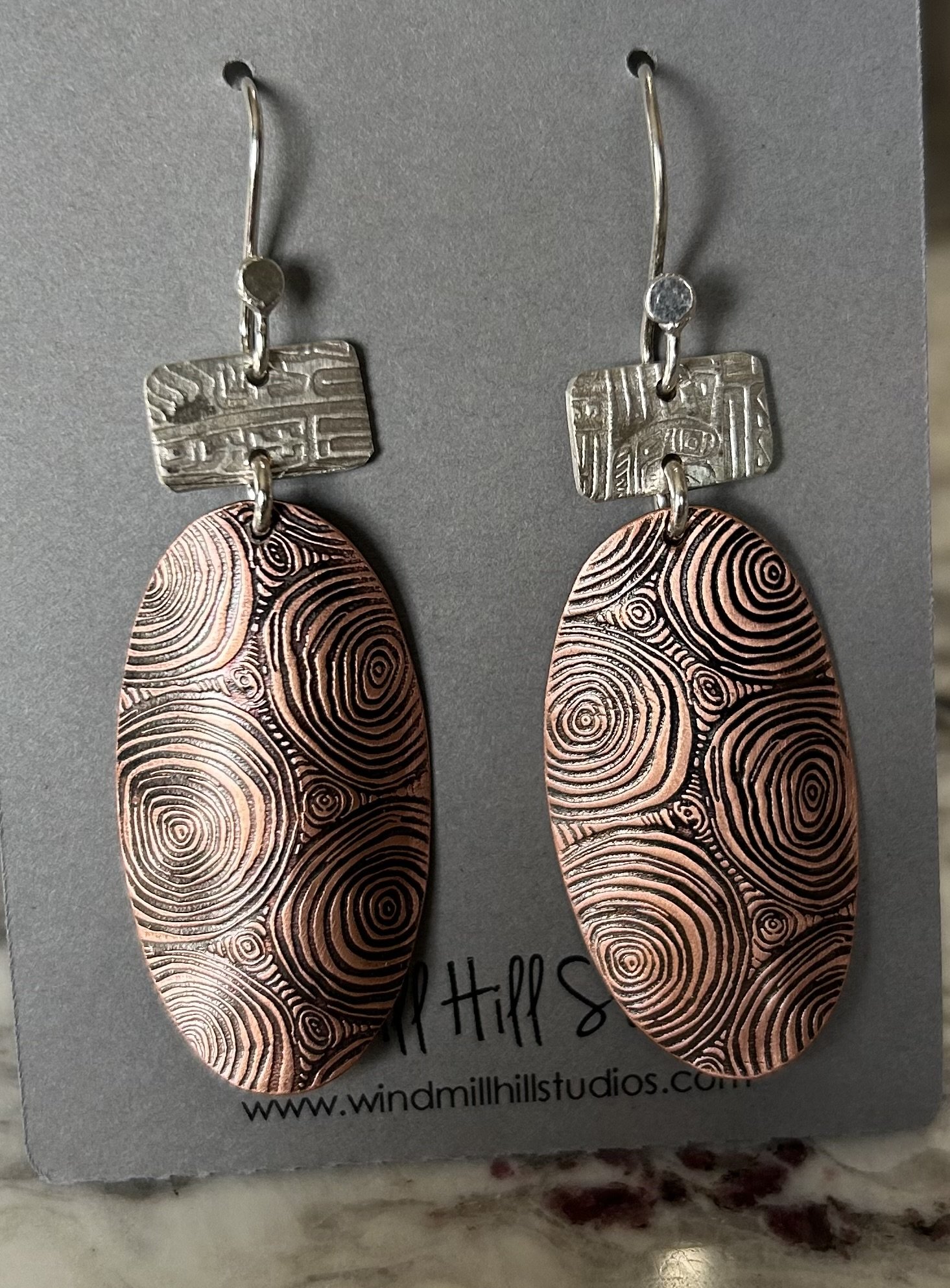 Copper and silver earrings