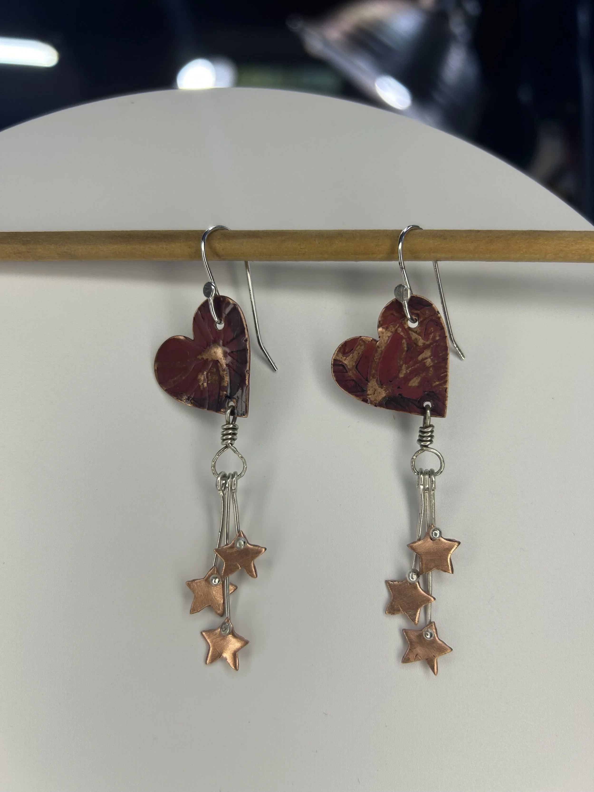 Copper heart earrings.