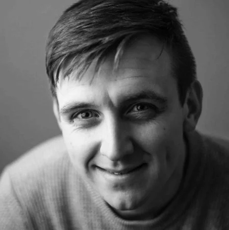 Portrait of Adam Robertson.