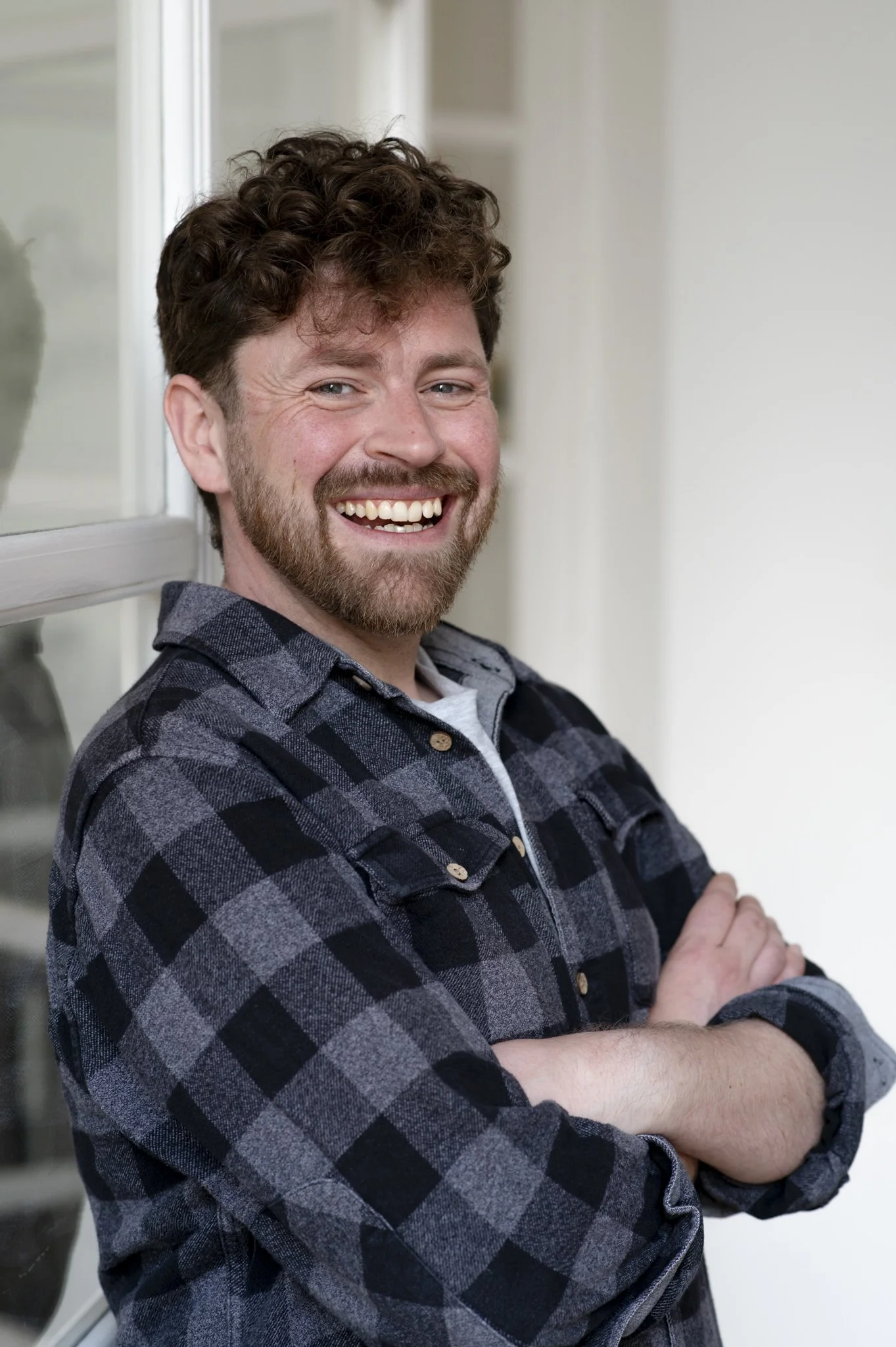 A portrait of Stewart Ainslie by Julie Broadfoot. Stew is dressed casually and is doing his best to look friendly.