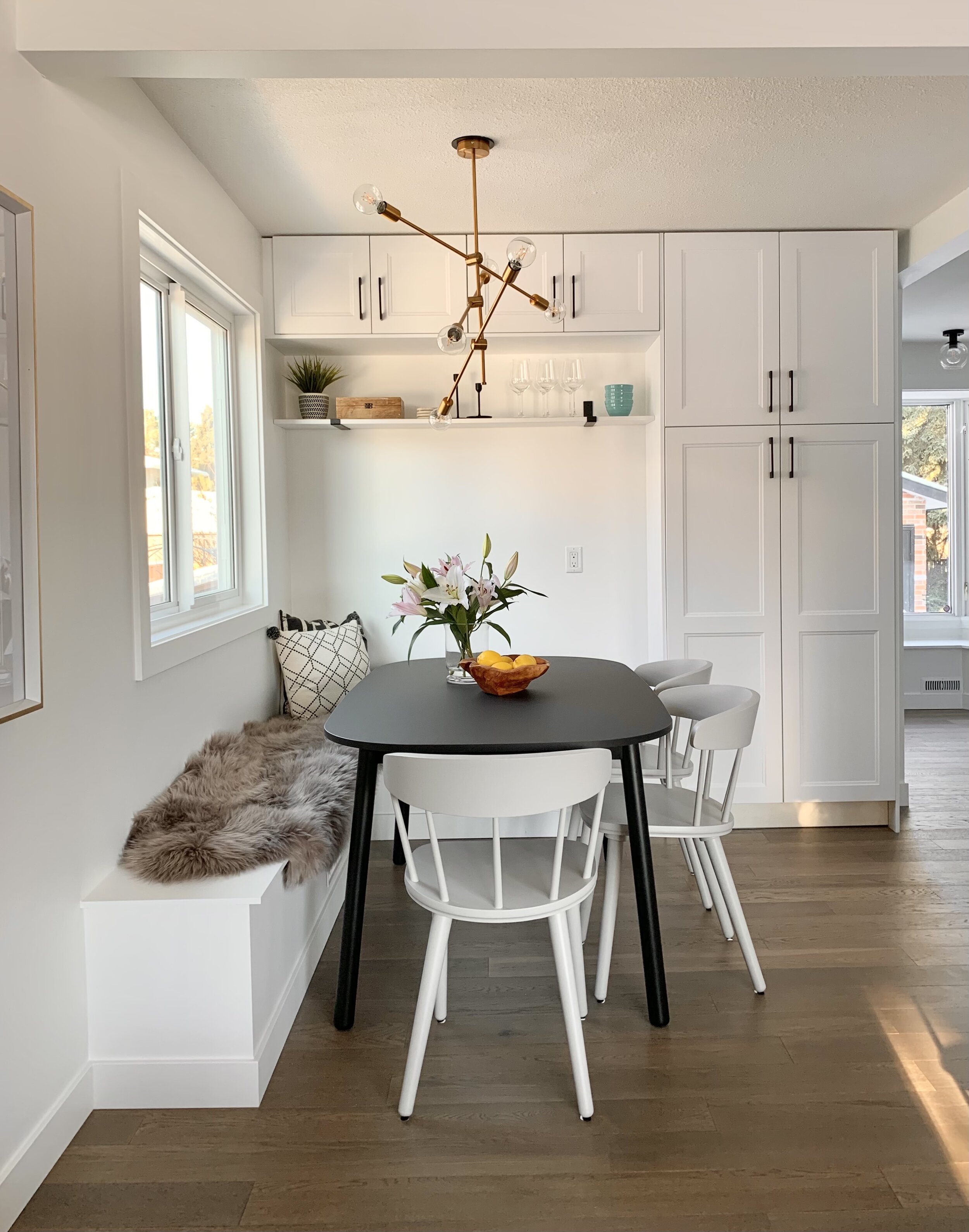 Windows above a breakfast nook with bench seating