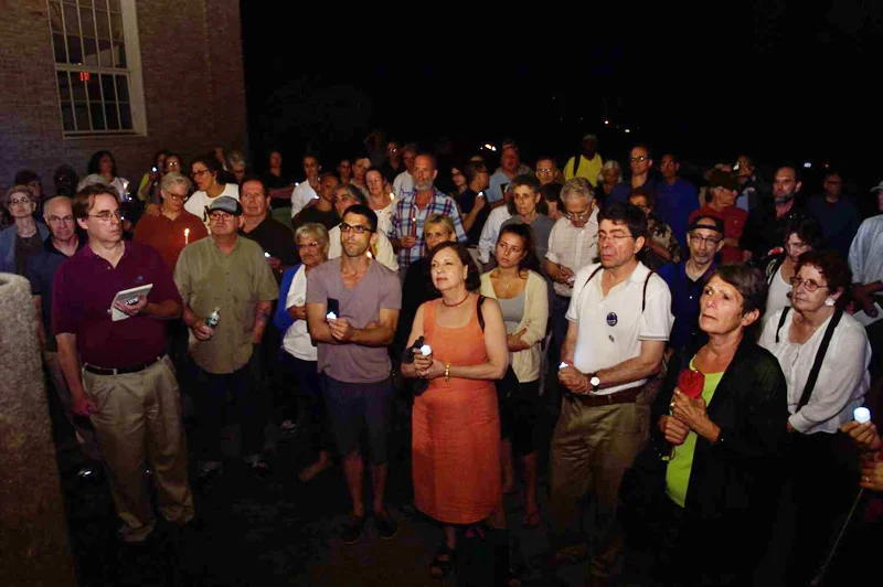 A crowd of roughly 150 turned out for the “Candles For Clemency” vigil outside Governor Andrew Cuomo’s home.