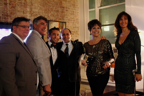 Honorees Paul Egan, Bryan Batt and Colby Melvin, Club President Allen Roskoff, Honoree Luci Arnaz and Model Carol Alt