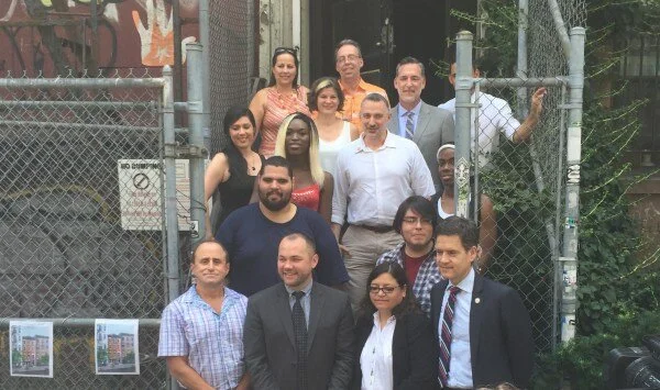 Residents of other Ali Forney facilities and staff members as well as local elected officials and members of the Cooper Square Committee gather at the Bea Arthur Residence. (Photos by Maria Rocha-Buschel)