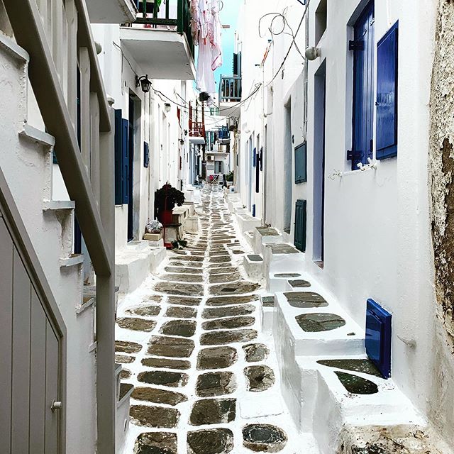 Laundry day in Mykonos #streetphotography #streetoftheday #mykonos #greece #justgoshoot #instagood #cityscape #iphonography #adventuresofbeebsandbeebs