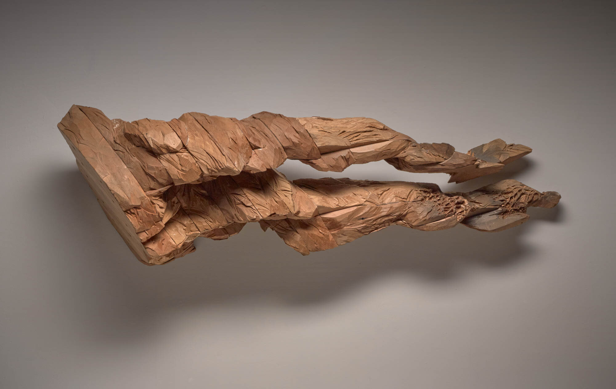       too much to erase (flying legs) , 2015 Cedar and graphite 21 x 68 x 18 in.  