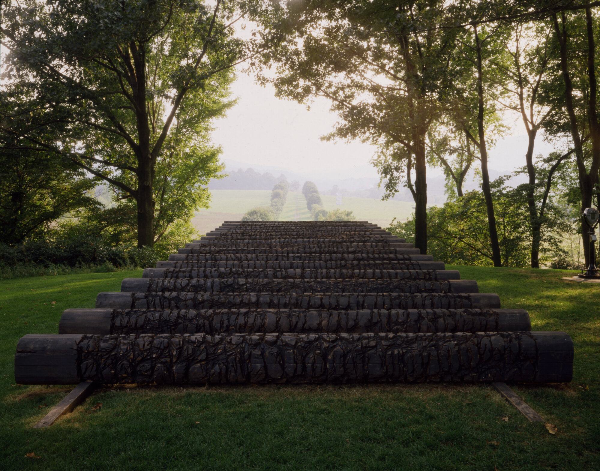       Land Rollers , 1992 Cedar and graphite 45 x 670 x 171.5 in.    MORE IMAGES   Storm King Art Center  