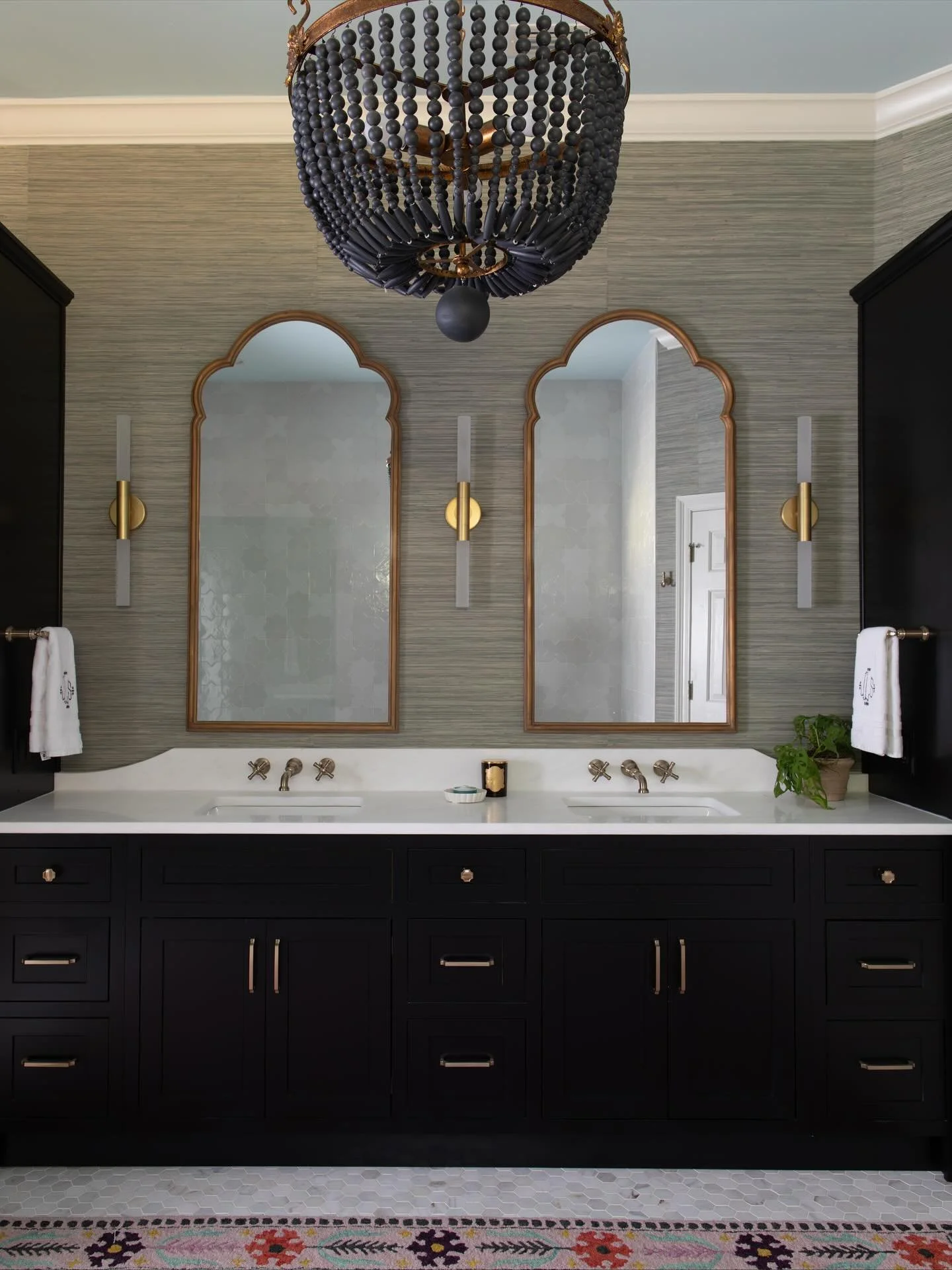 What a before and after! We are finally  sharing the professional photos of  this Primary Bath renovation we did for a fun client and friend who loves travel, art, pattern and color! When we began designing the space, we wanted to be sure it fit her 