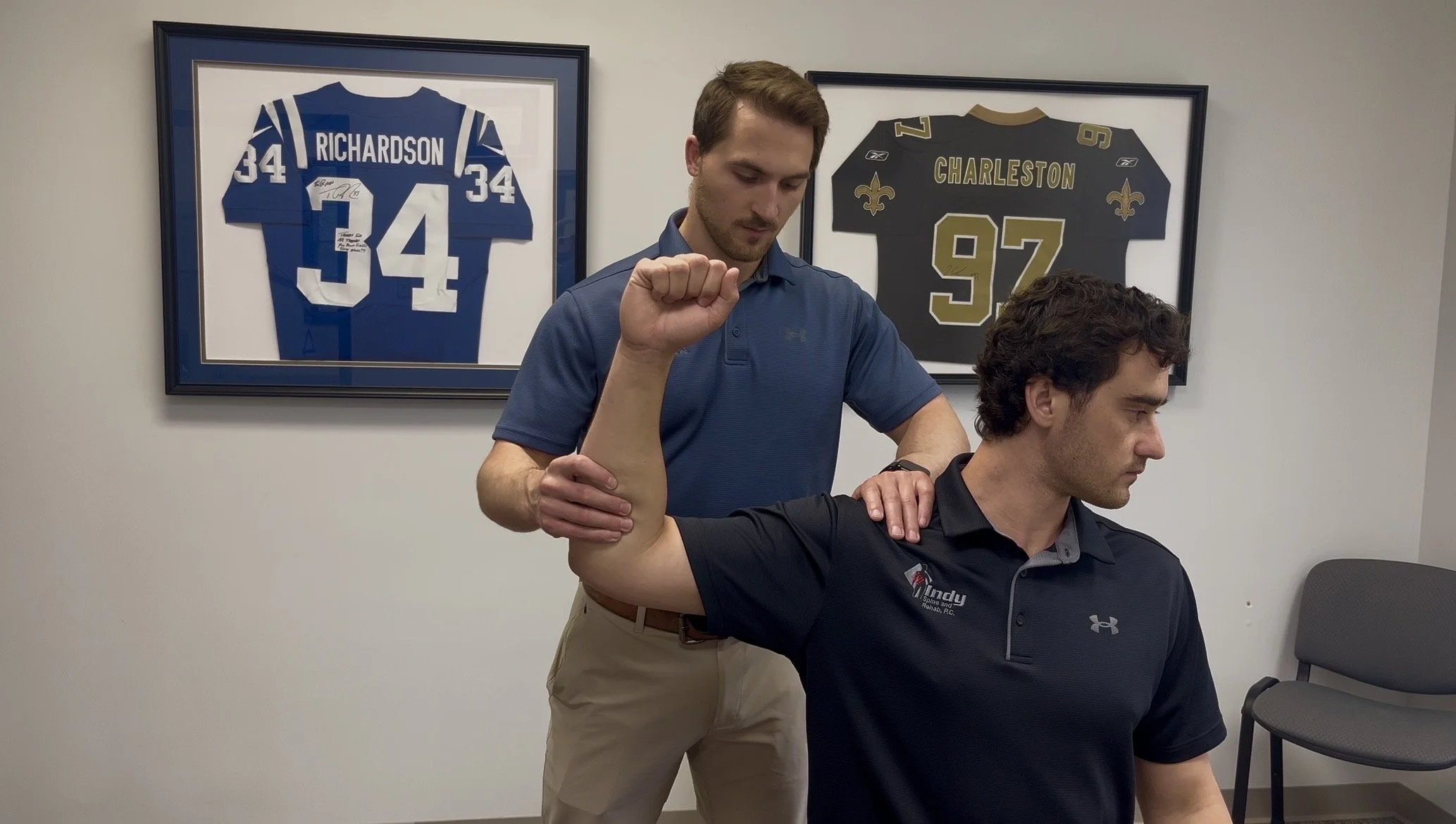 Sports chiropractor Dr. Brian Fuller performing advanced rotator cuff manual therapy for shoulder pain relief at Indy Spine and Rehab in Carmel, Indiana.