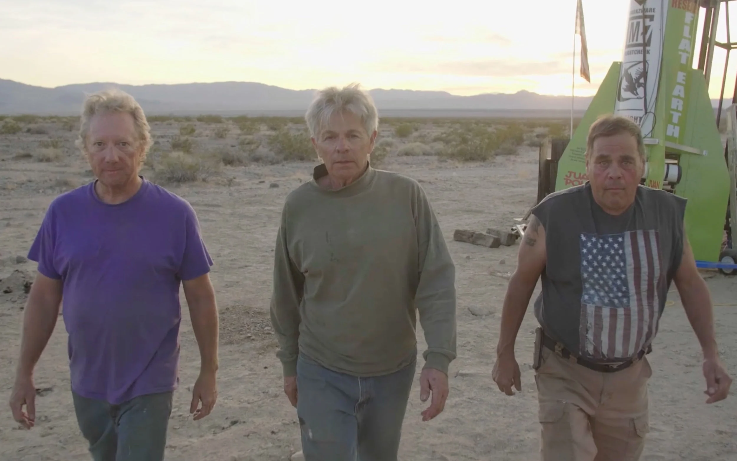 The Rocket Squad. Patrick Marchese, 'Mad Mike' Hughes, and Waldo Stakes work on the rocket in the California desert near Amboy.