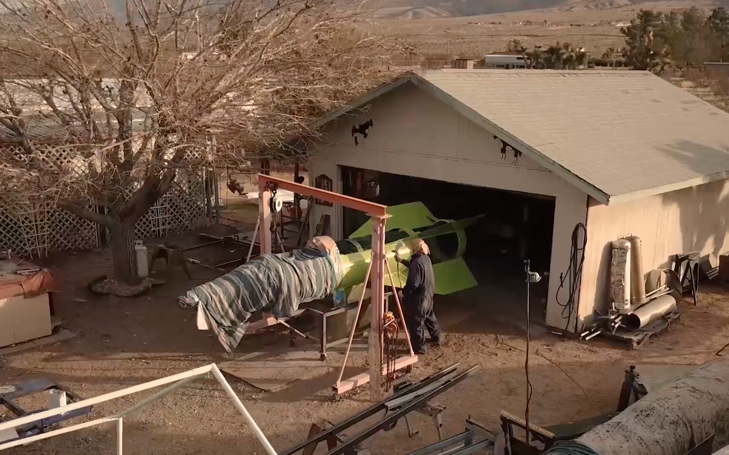 'Mad Mike' paints the rocket at his home in Apple Valley, CA.