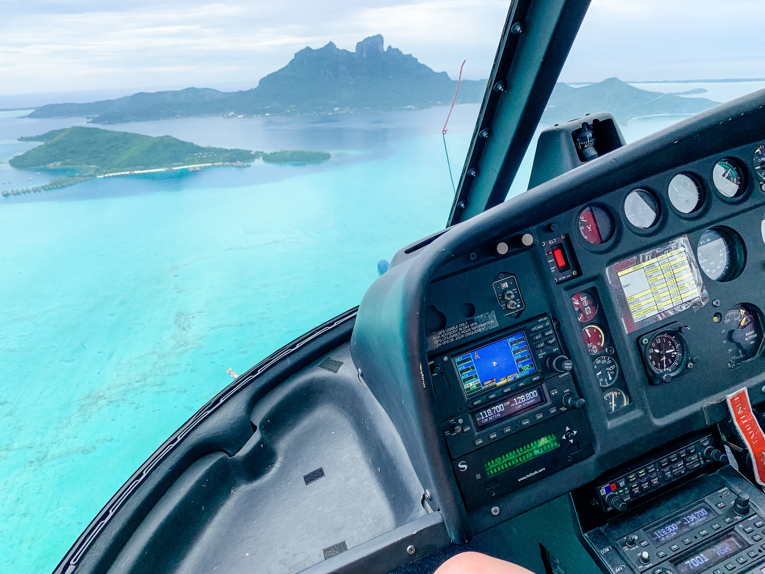 Helicopter tour over Bora Bora, the overwater bungalows, Mt Otemanu, and motus