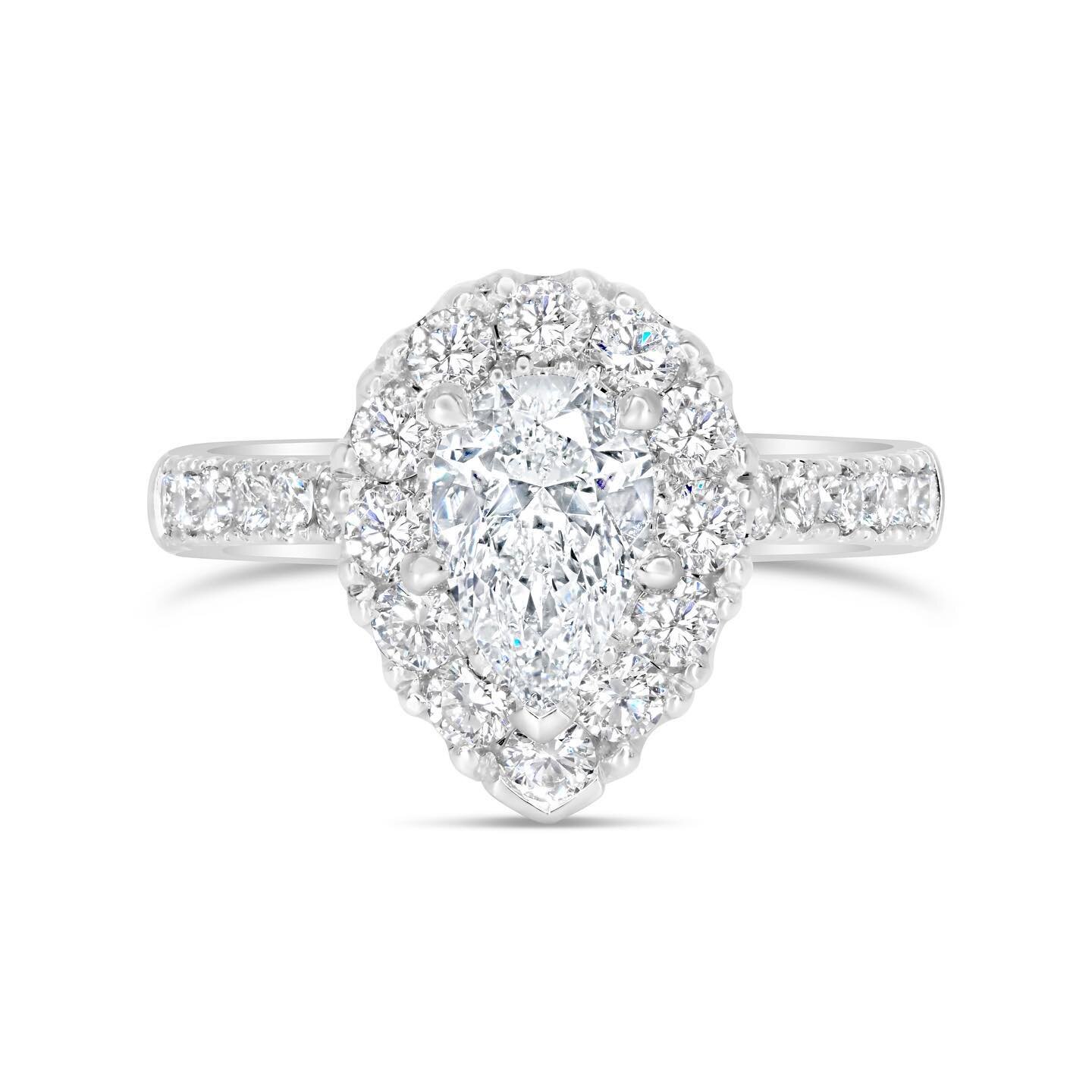 Platinum Pearfection! 
Hand made with only the highest quality diamonds this ring will take your breath away.