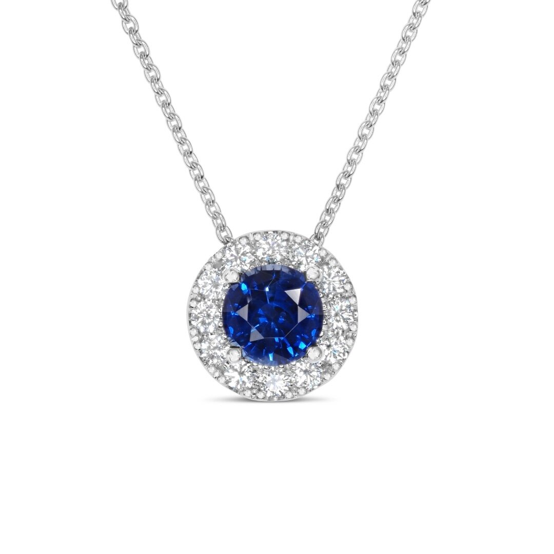A stunning cornflower blue Ceylon sapphire surrounded by the highest quality brilliant white diamonds is truly captivating. Hidden detailing in the basket makes this handcrafted pendant a unique piece to add to your collection.