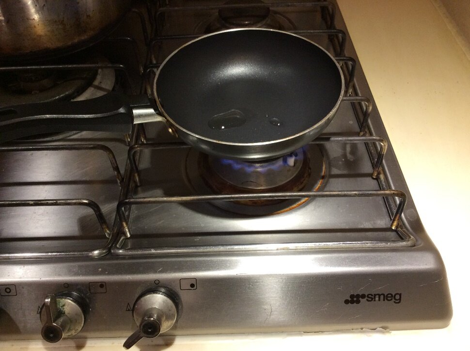 Step 4: Pour some oil into the pan