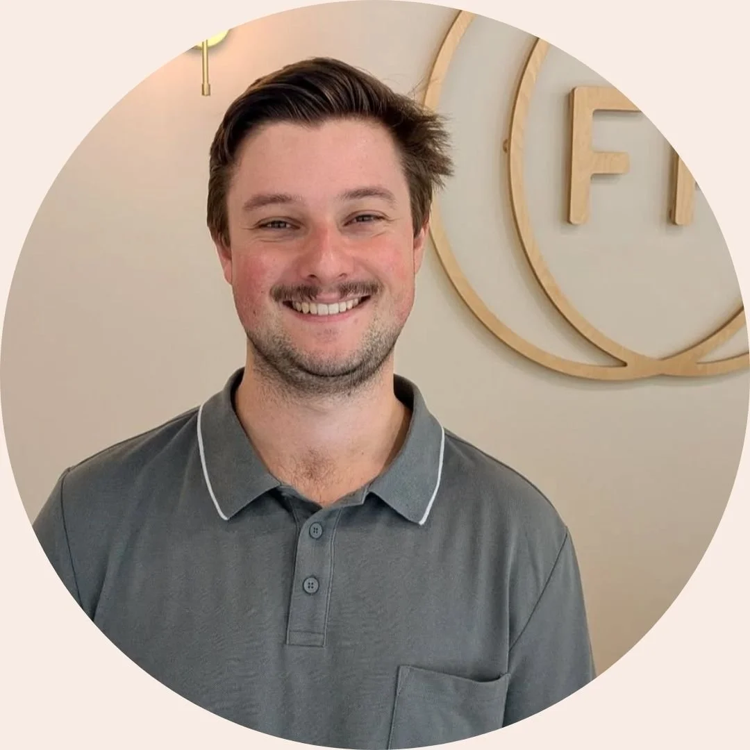 Photo of Jesse, the osteopath, smiling at camera