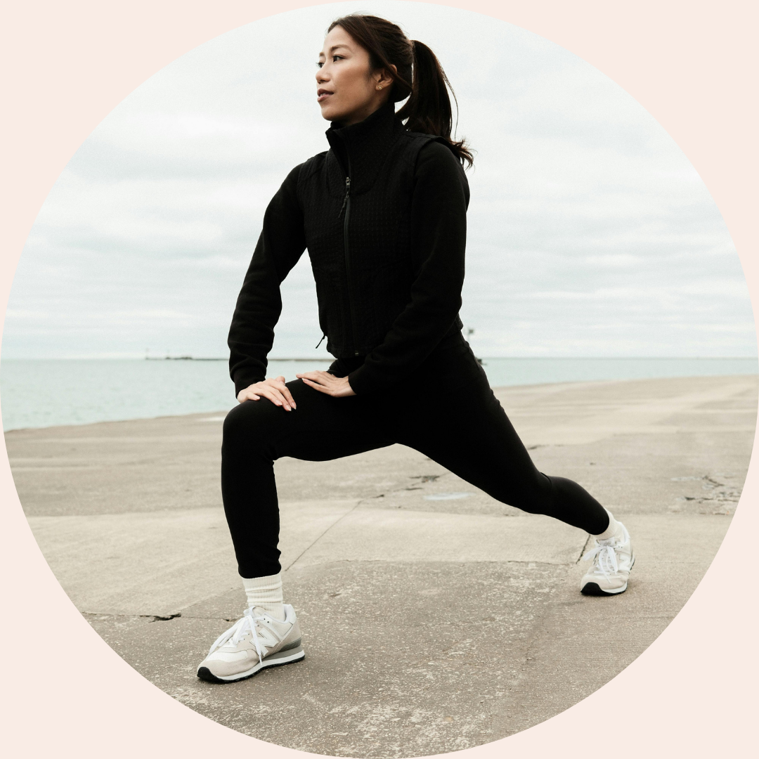 woman stretching on her own, about to go for a run