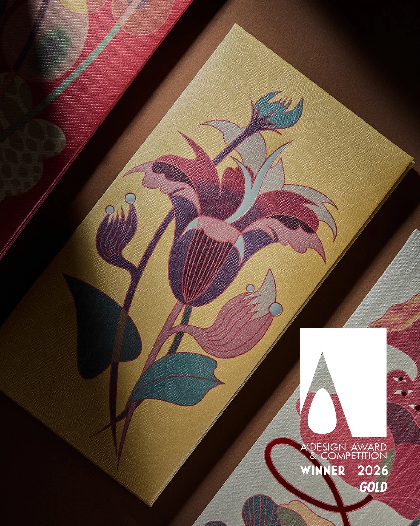 Our favourite self-initiated object, our Year of the Snake Red Packets, has been awarded Gold in the Giftware Design at the A&rsquo; Design Award 2026.

Reinterpreting the Chinese Zodiac, the fluid grace of the serpent is intertwined with timeless fl