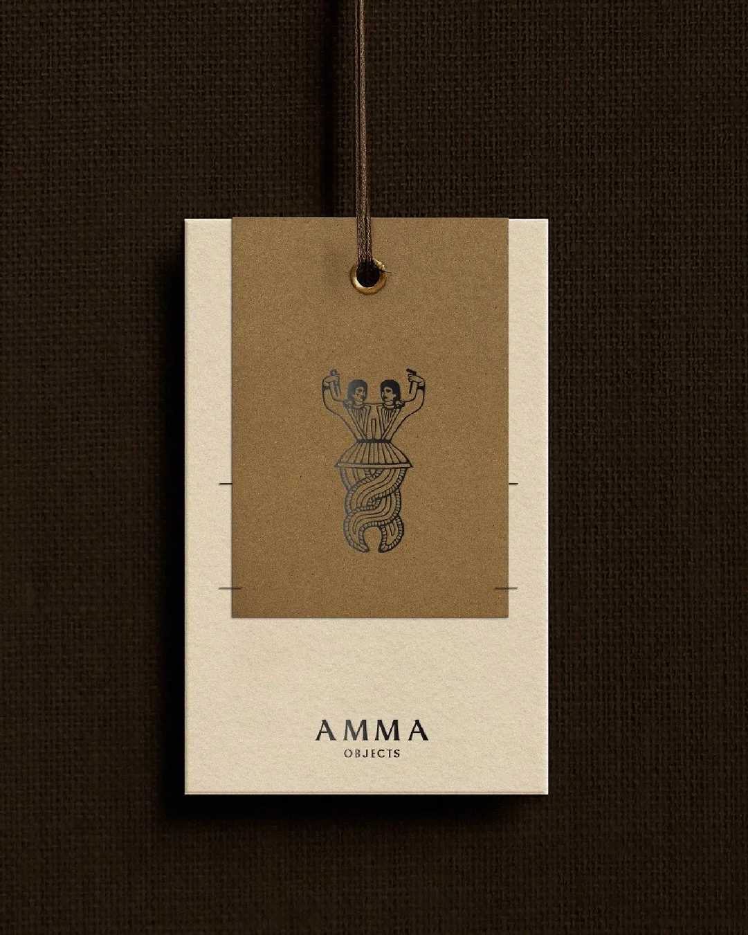 The AMMA Objects experience unfolds through a curated suite of collaterals, where raw stitching, matte UV finishes, and hand-drawn details recall ancient pictograms and the earth&rsquo;s enduring memory. 

Online, a clean, considered design pairs a s