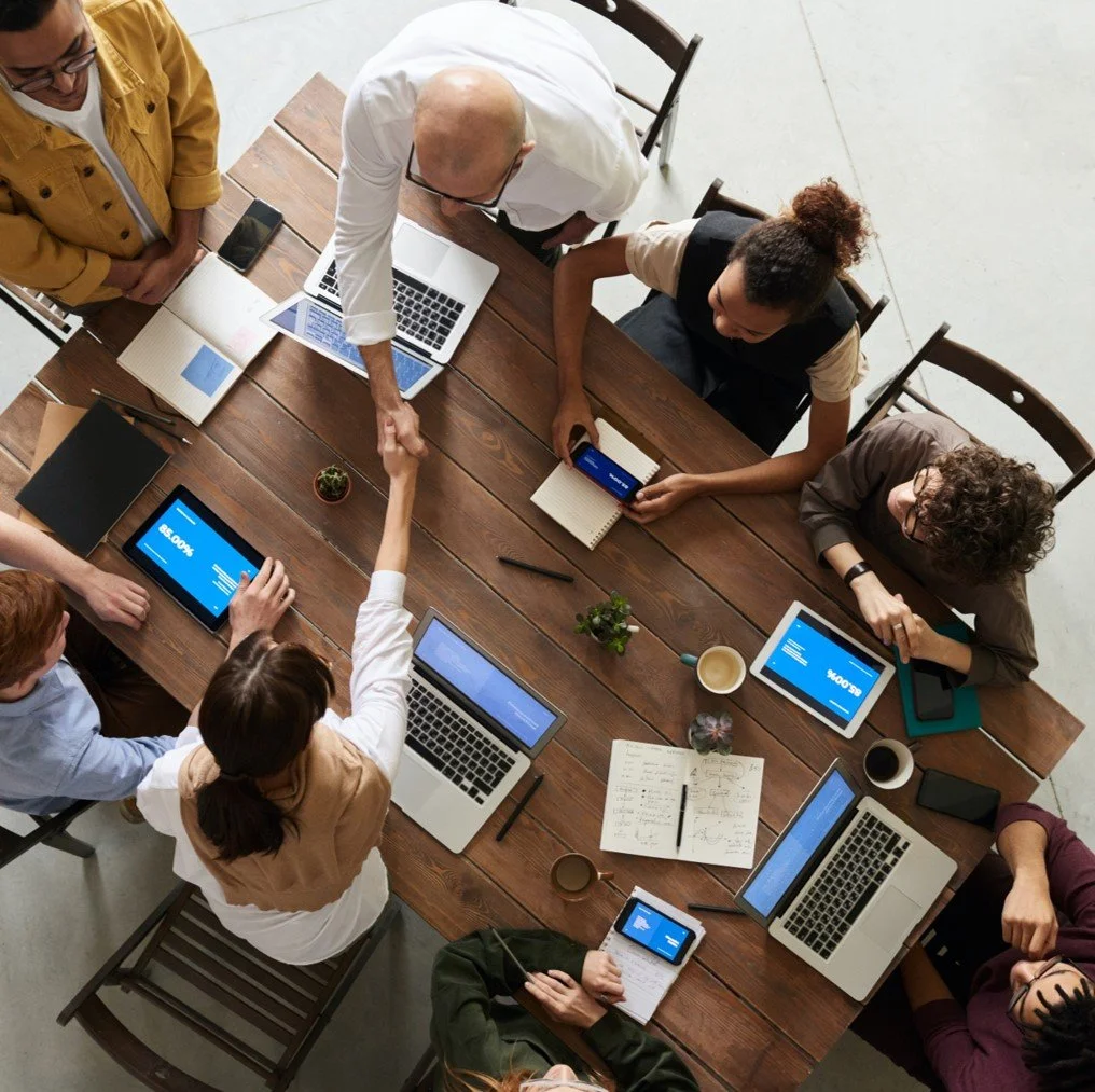 Team collaborating at a meeting table