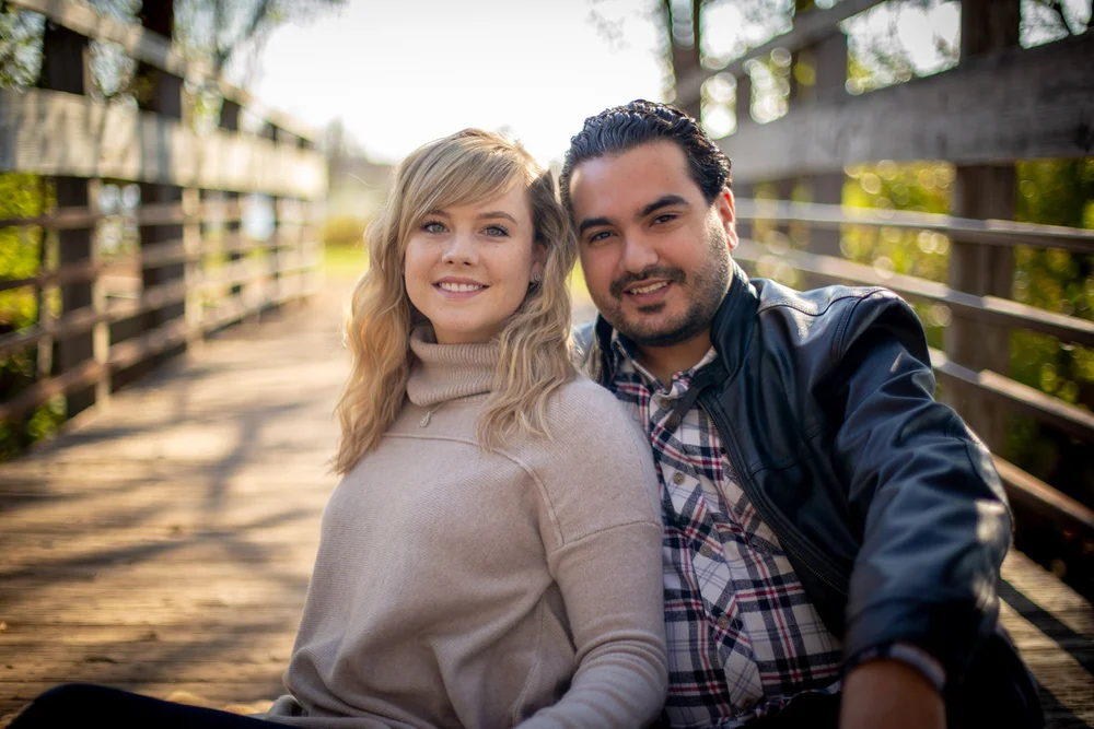 Couple walking among curated botanical pathways at Matthaei Botanical Gardens