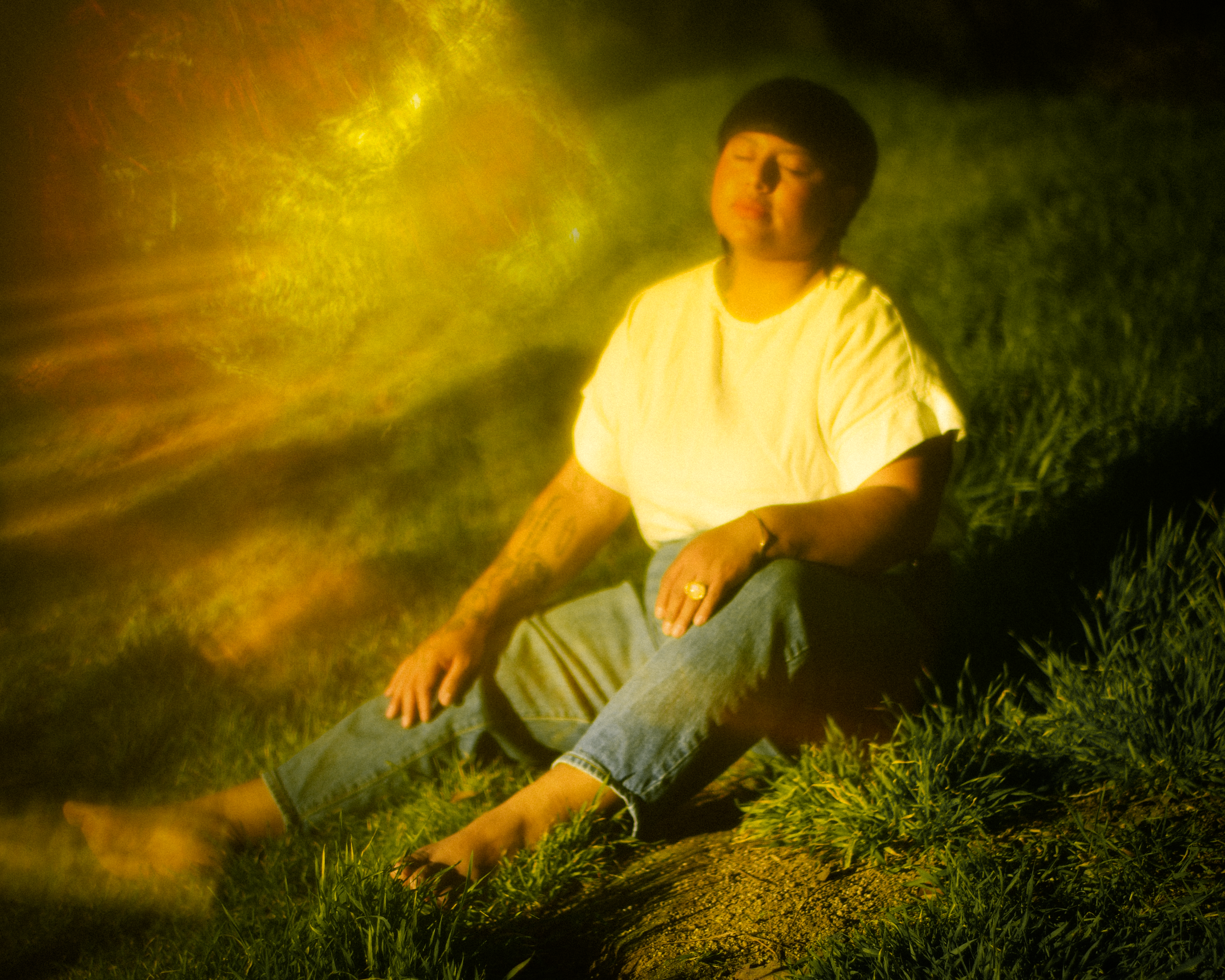 Author portrait of author of "Nostalgia & Borders" and "Somewhere we are Human" Sonia Guiñansaca, captured in Los Angeles by documentary and portrait photographer Gí Tenamá, focusing on presence, voice, and identity.