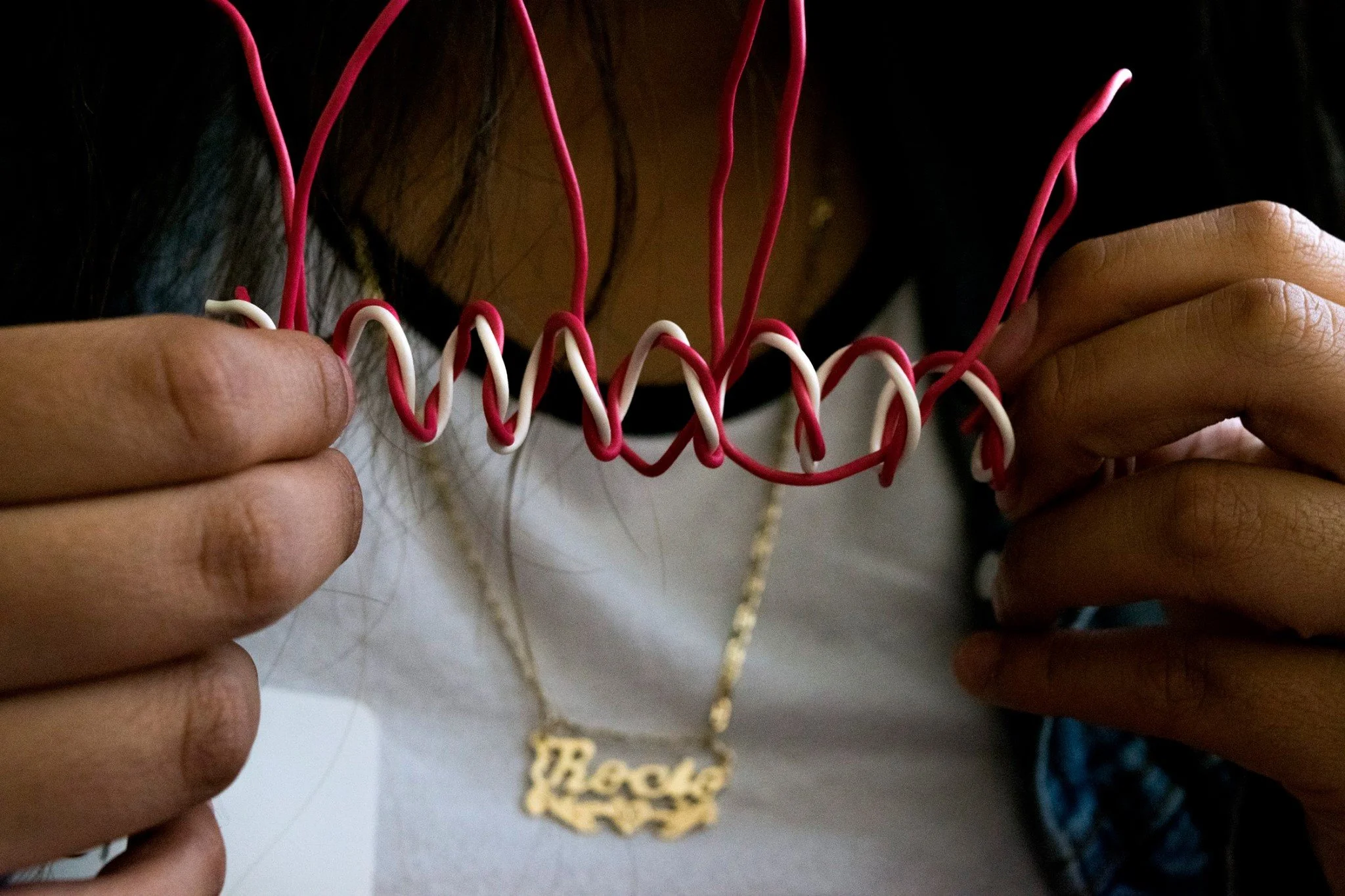 Rocio Navarro shows a stress relief exercise in her home in the Bayview District on April 27, 2016.