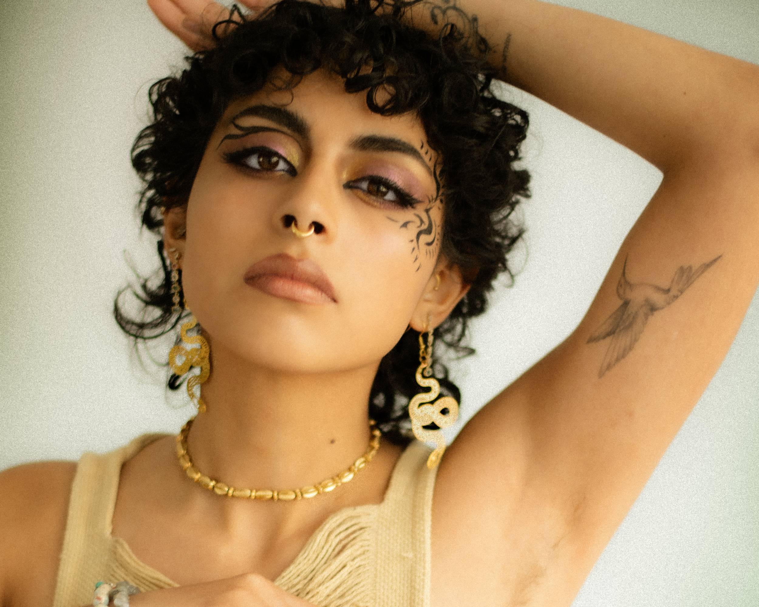 Los Angeles-based fashion editorial portrait photographer documenting style as self-expression, movement, and visual identity for a jewelry campaign, featuring a Latina model