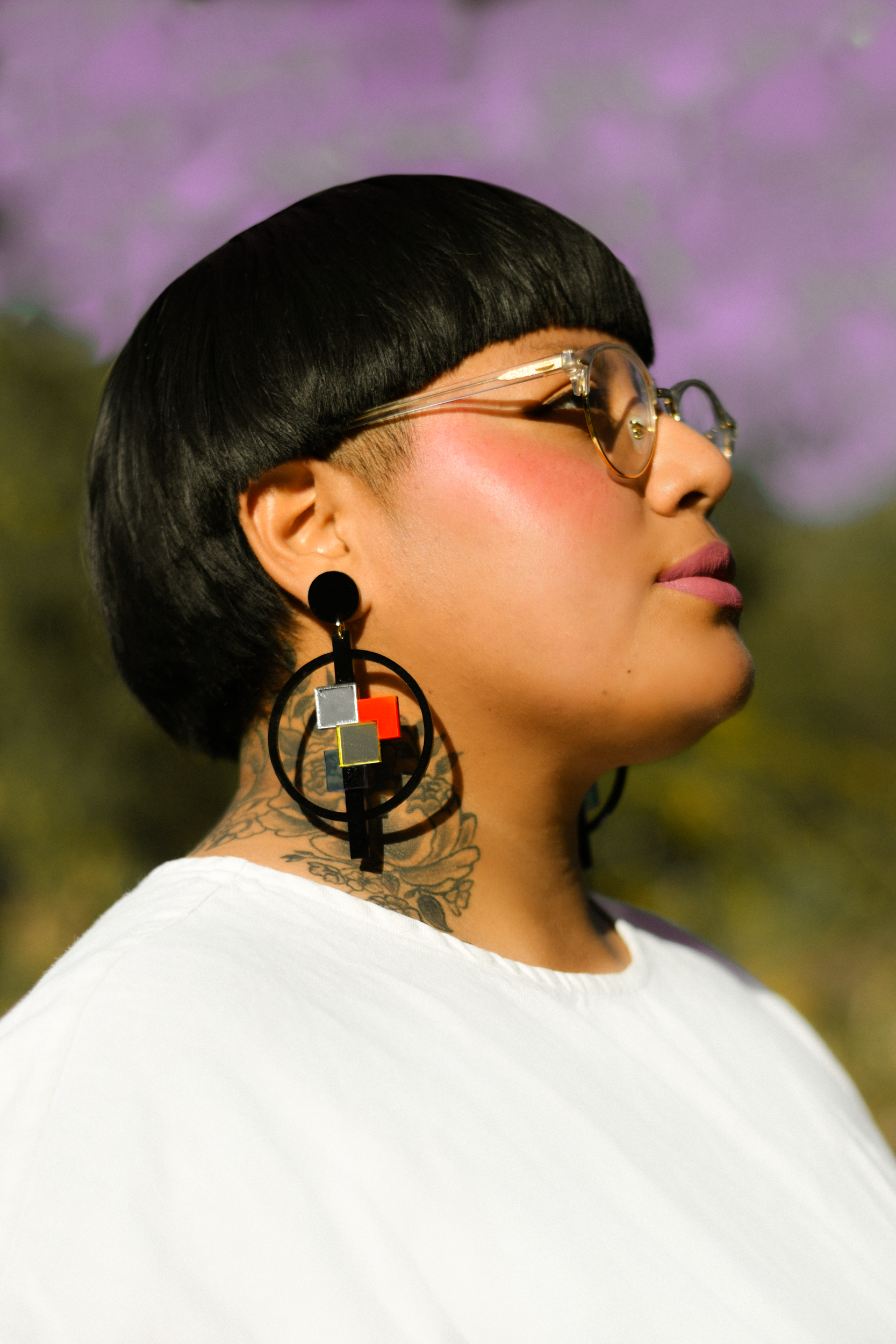 Author portrait of author of "Nostalgia & Borders" and "Somewhere we are Human" Sonia Guiñansaca, captured in Los Angeles by documentary and portrait photographer Gí Tenamá, focusing on presence, voice, and identity.