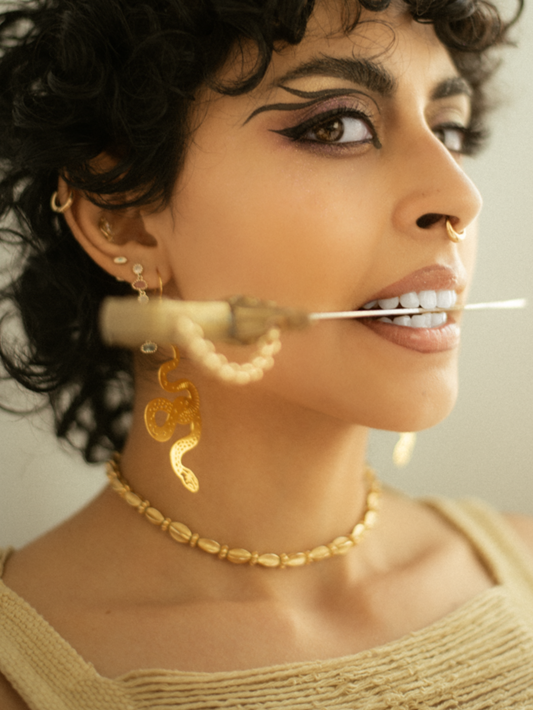 Los Angeles-based fashion editorial portrait photographer documenting style as self-expression, movement, and visual identity for a jewelry campaign, featuring a Latina model