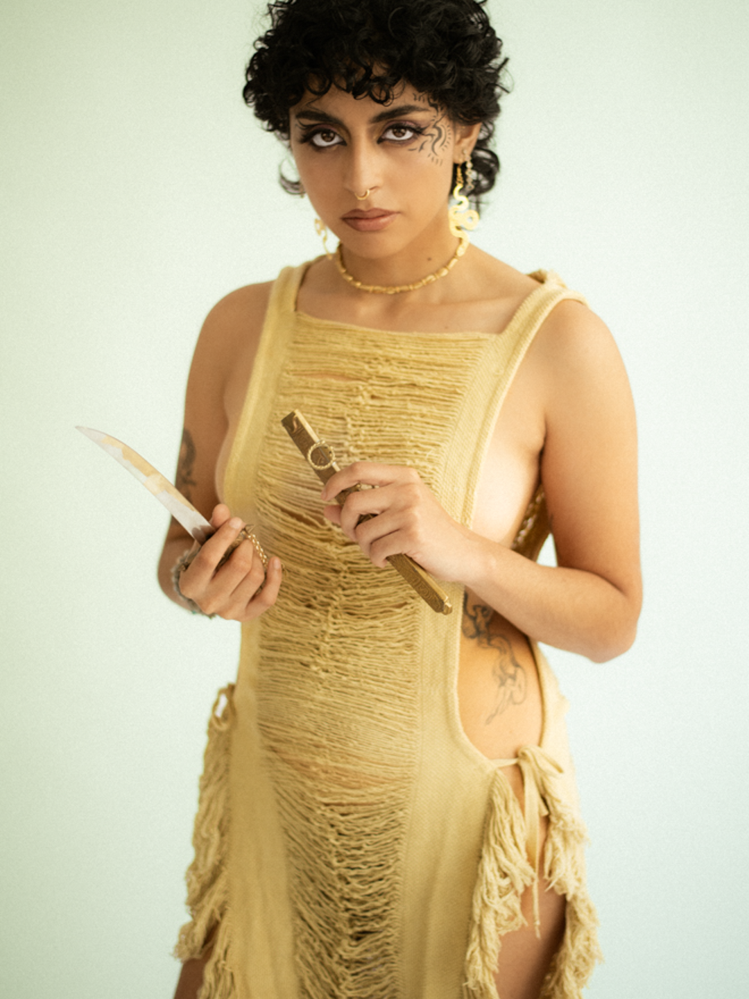 Los Angeles-based fashion editorial portrait photographer documenting style as self-expression, movement, and visual identity for a jewelry campaign, featuring a Latina model