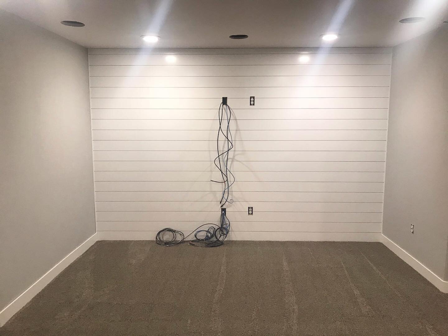What kind of entertainment center do you envision for this shiplap wall? 
Such a fun focal feature that brightens up this full basement finish that is being completed very soon!