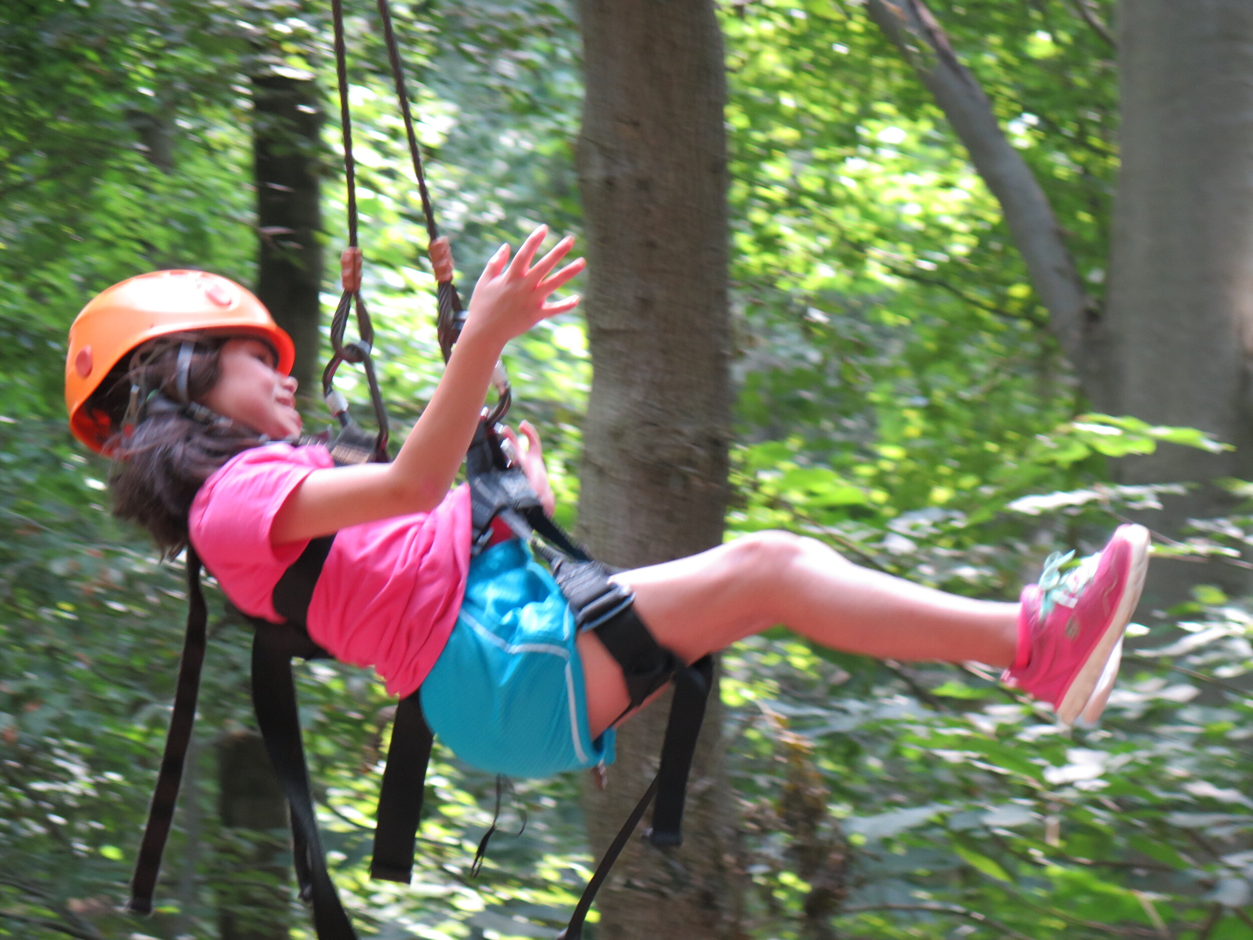 Heart Camp girl on swing.JPG