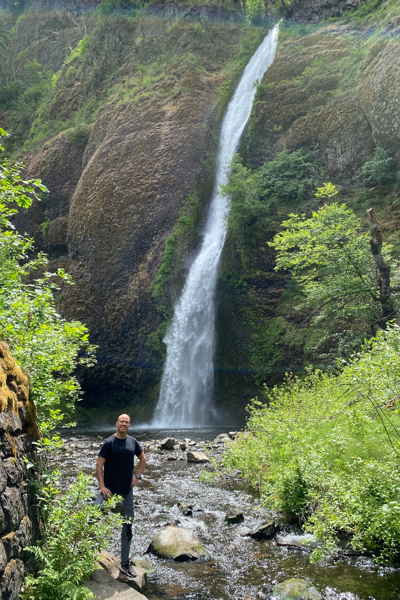 Brendan Alex Phoenix photographs Finnish friend during visit to Horsetail Falls in summer of 2023.