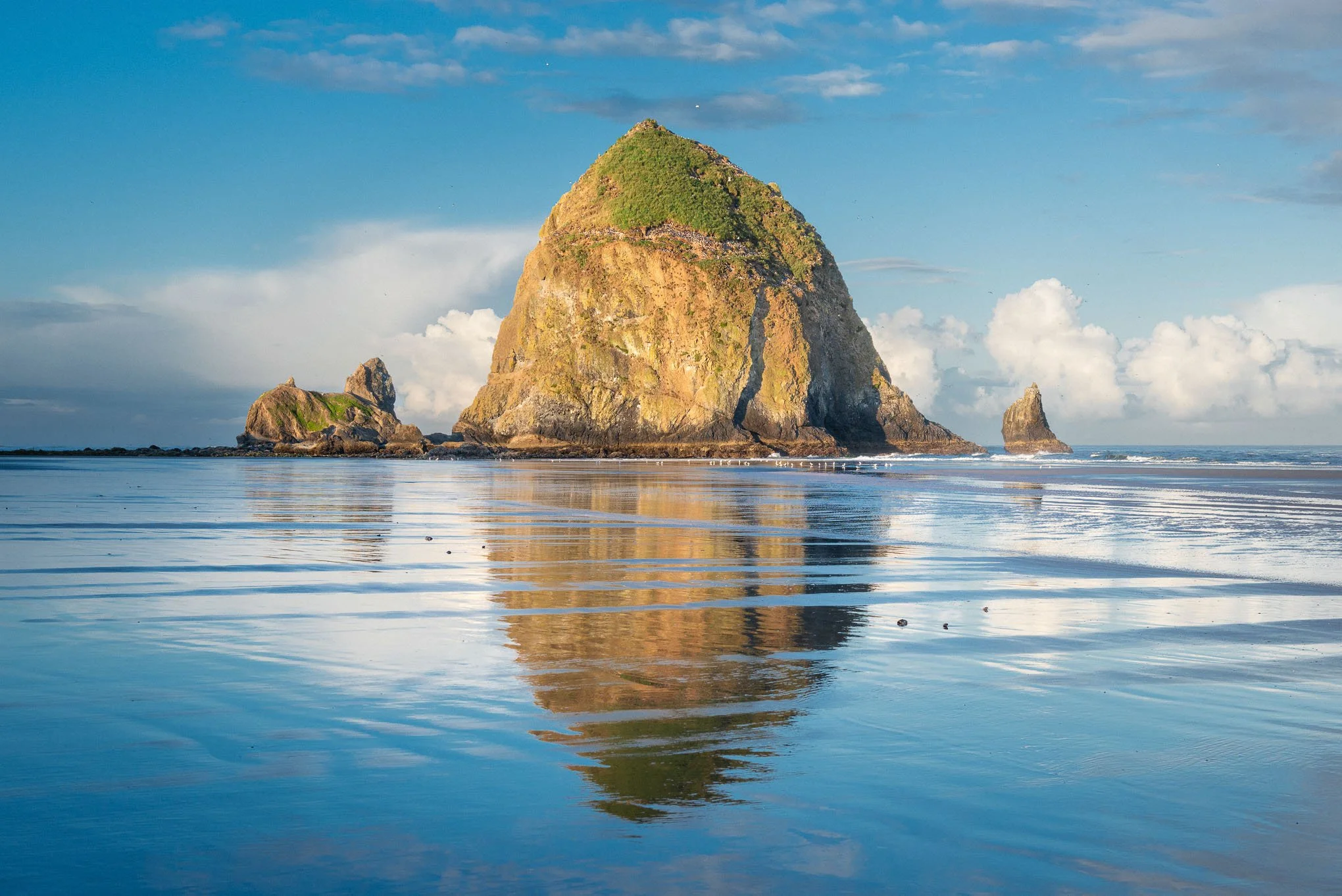 reflections-1-sunrise-haystack-rock-low-tide-cannon-beach-oregon-landscape-photography-brendan-alex-phoenix.jpg