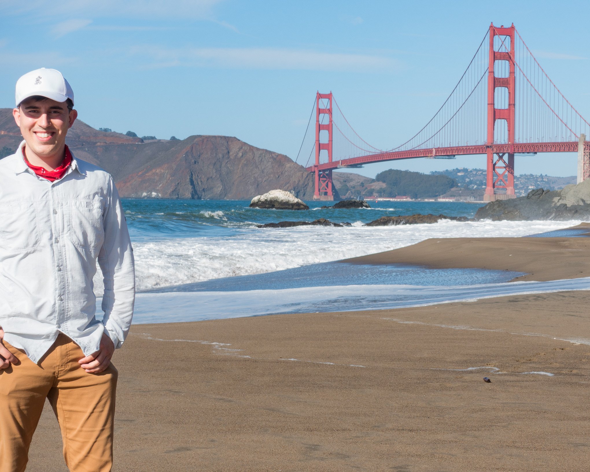 Photographic artist Brendan Alex Phoenix standing at Baker Beach, San Francisco on a clear day in October, 2018.