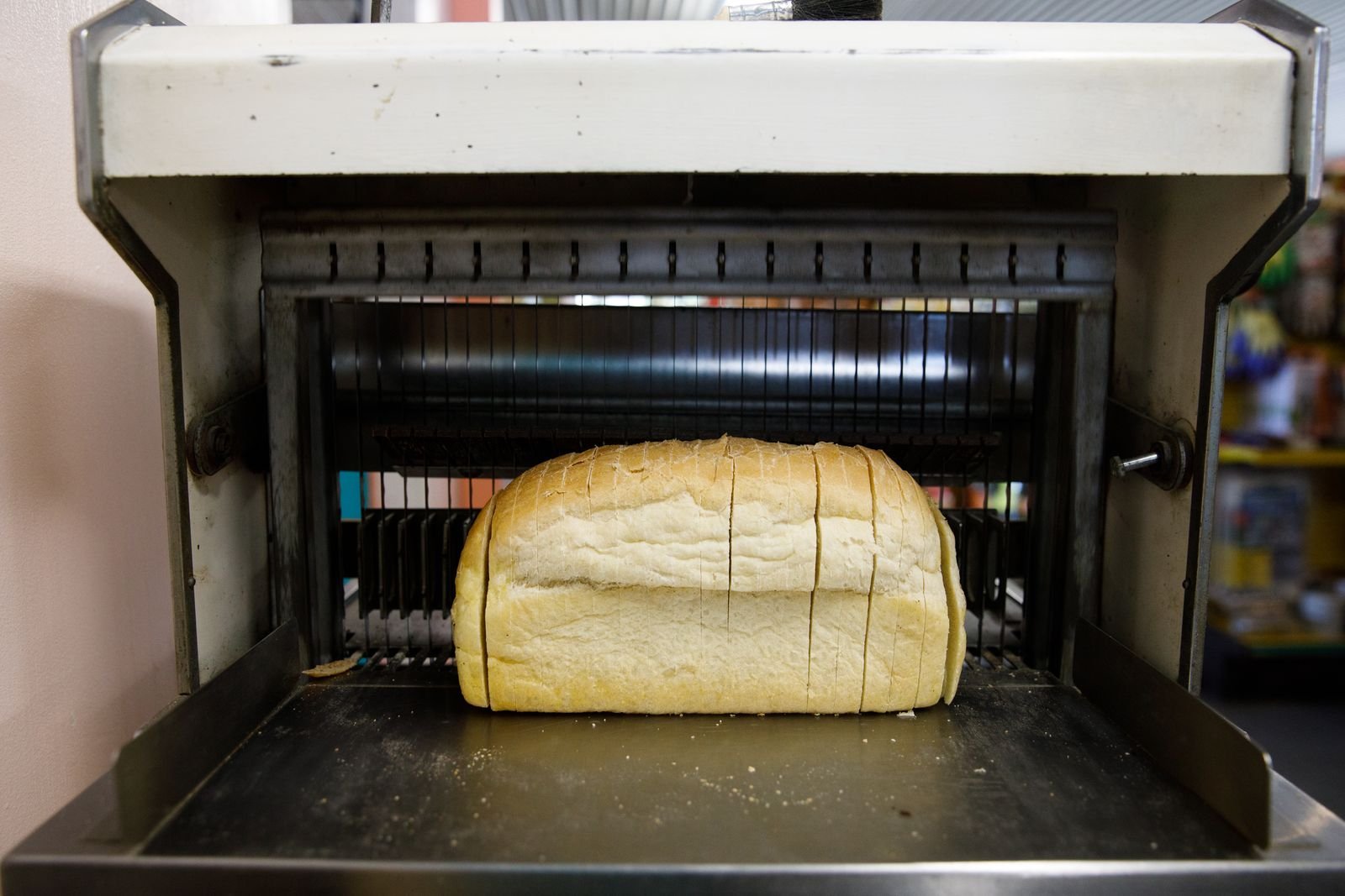 The bread slicer - it's a big part of our cafe ambiance! (IYKYK) 
But seriously, this machine is awesome and did you know we can slice our freshly baked bread for you? Just ask! 

White and wheat sandwich breads are baked daily. Our sourdough schedul