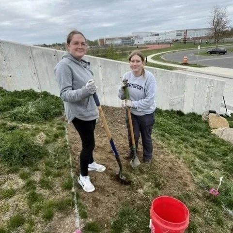 Volunteers prep the garden for planting