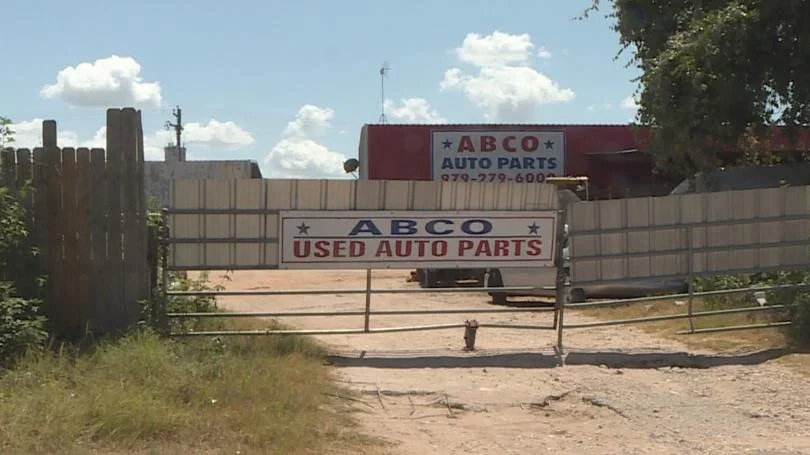 The accident occurred at an auto salvage business on State Highway 6. (KBTX photo)