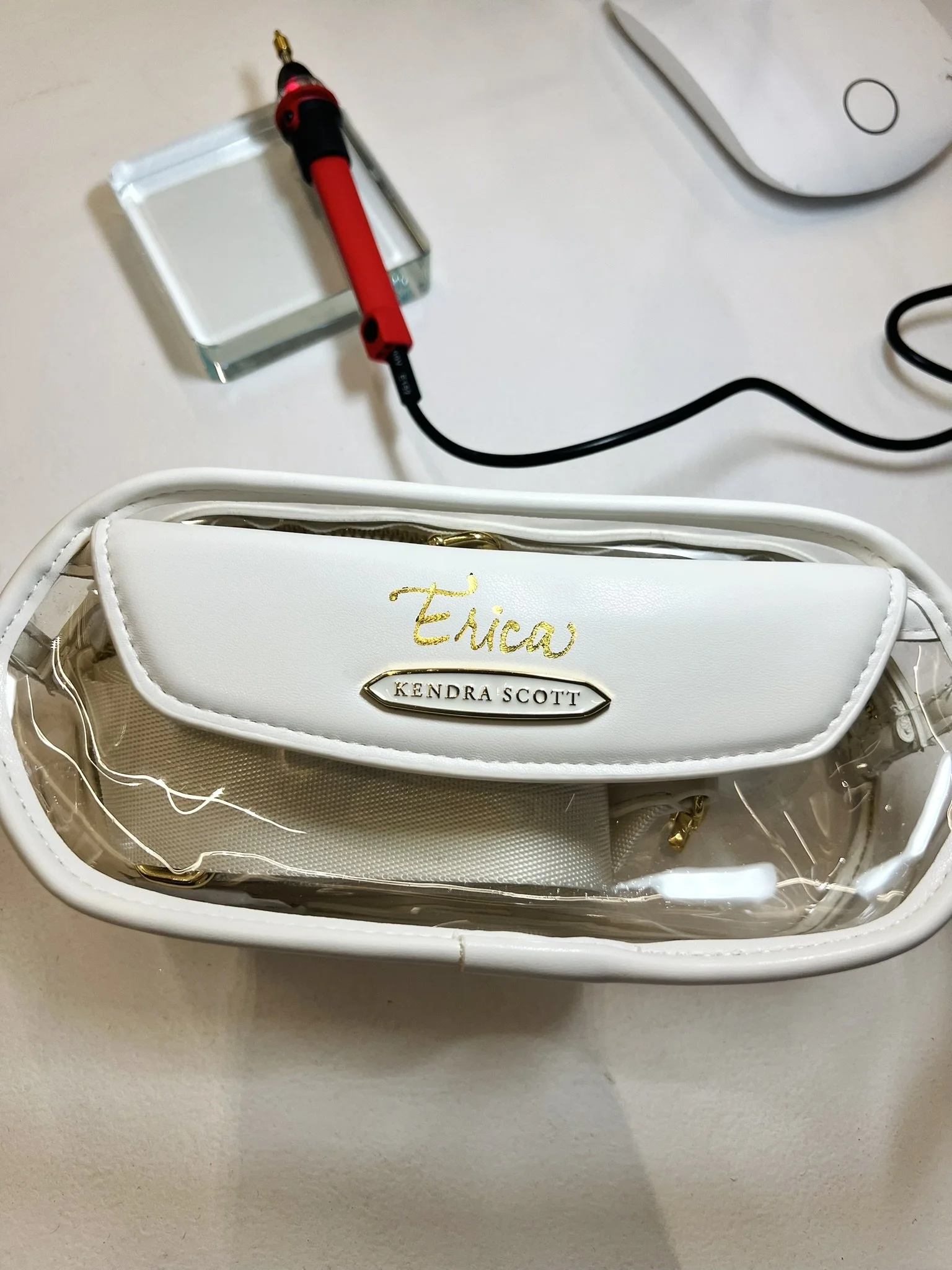 gold embossing on kendra scott bag