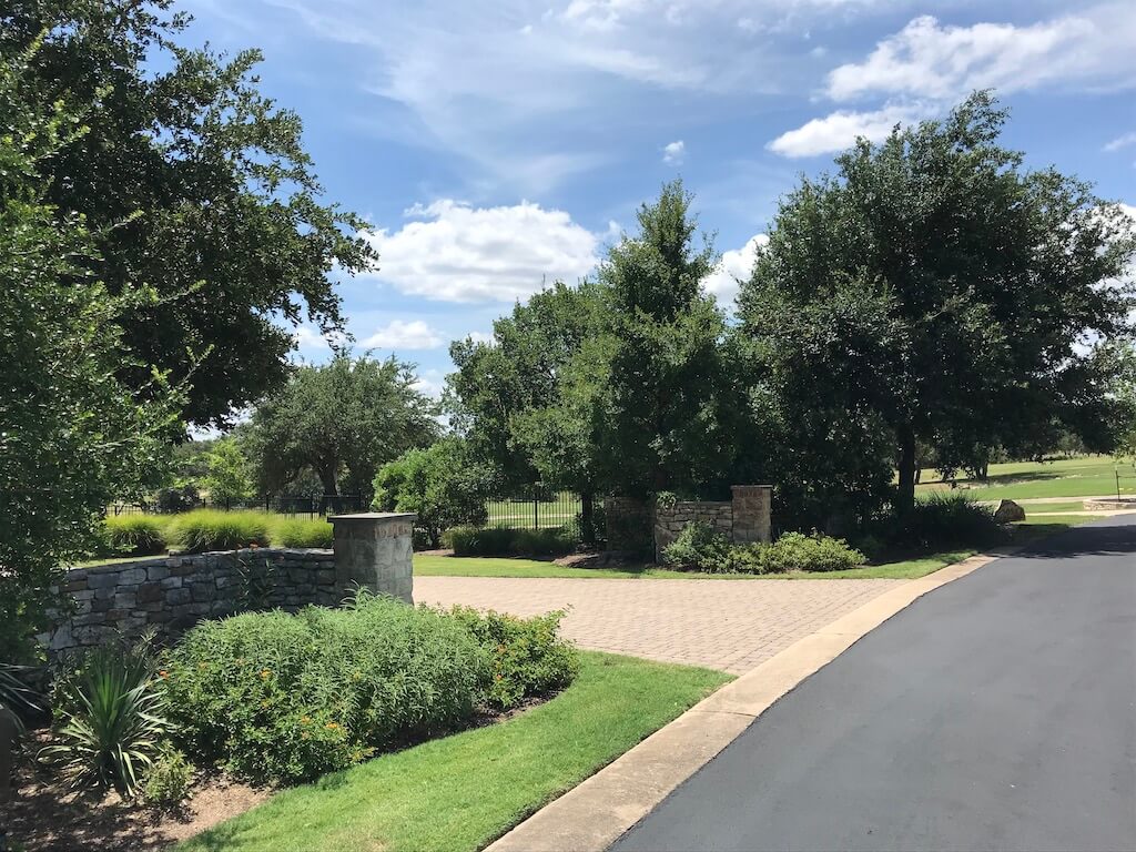 hill country residential landscape after